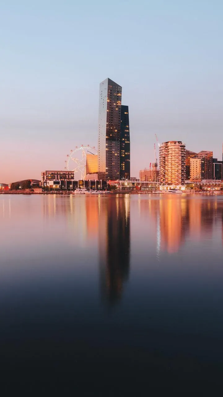 City Skyline with Reflecting Water Beautiful Wallpaper