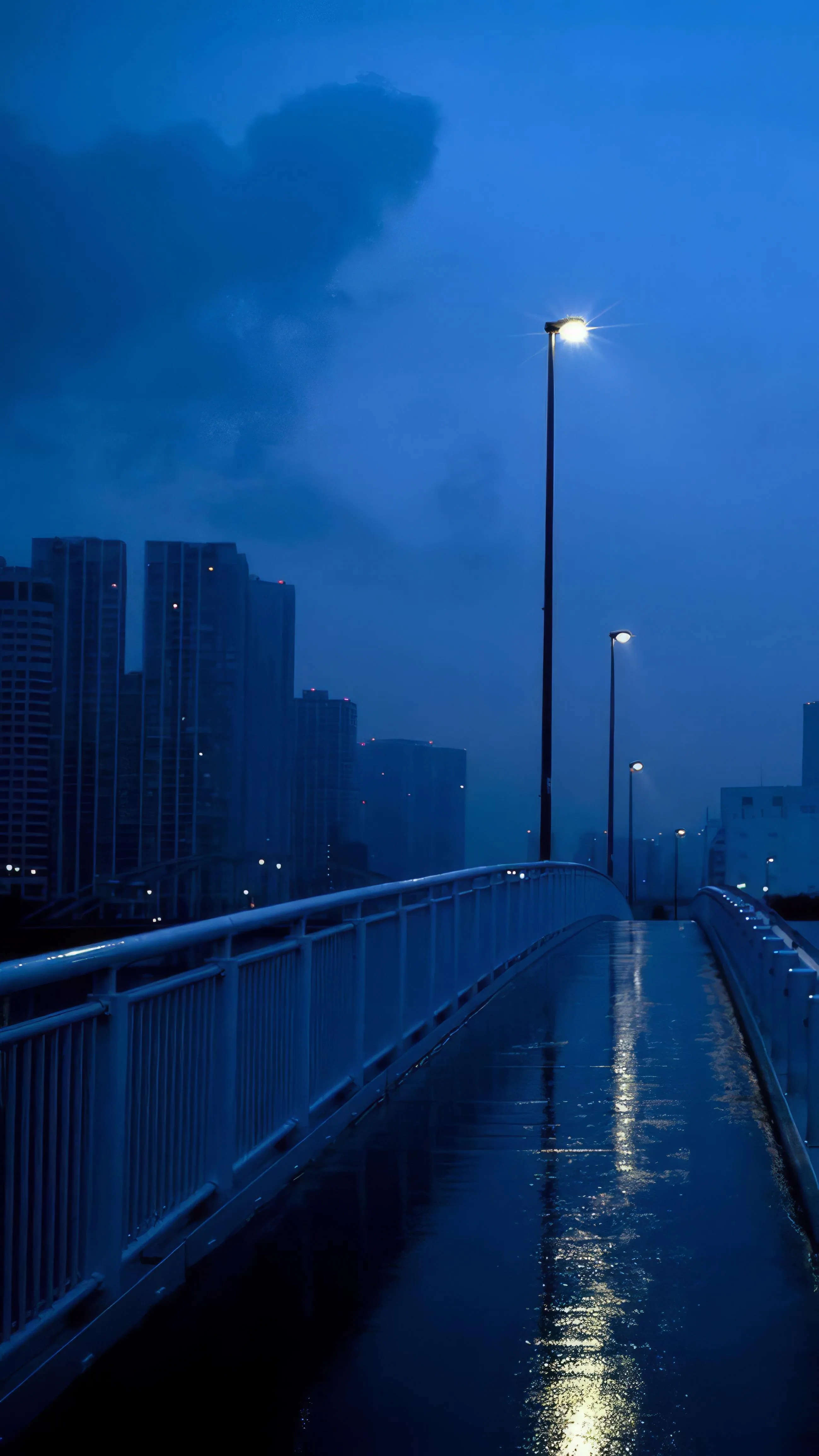 City Street at Night with Blue Streetlights and Rain