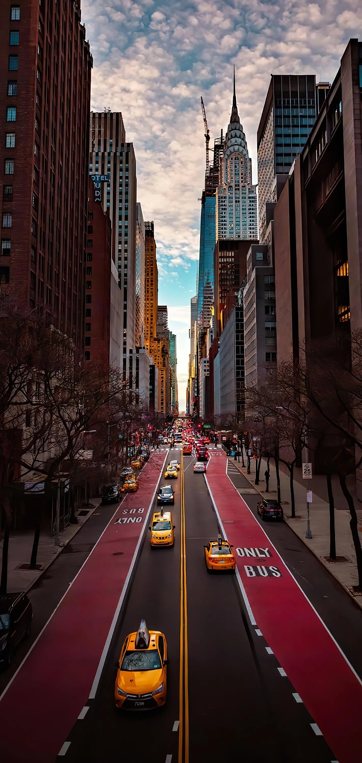 City Street View with Tall Buildings and Busy Traffic