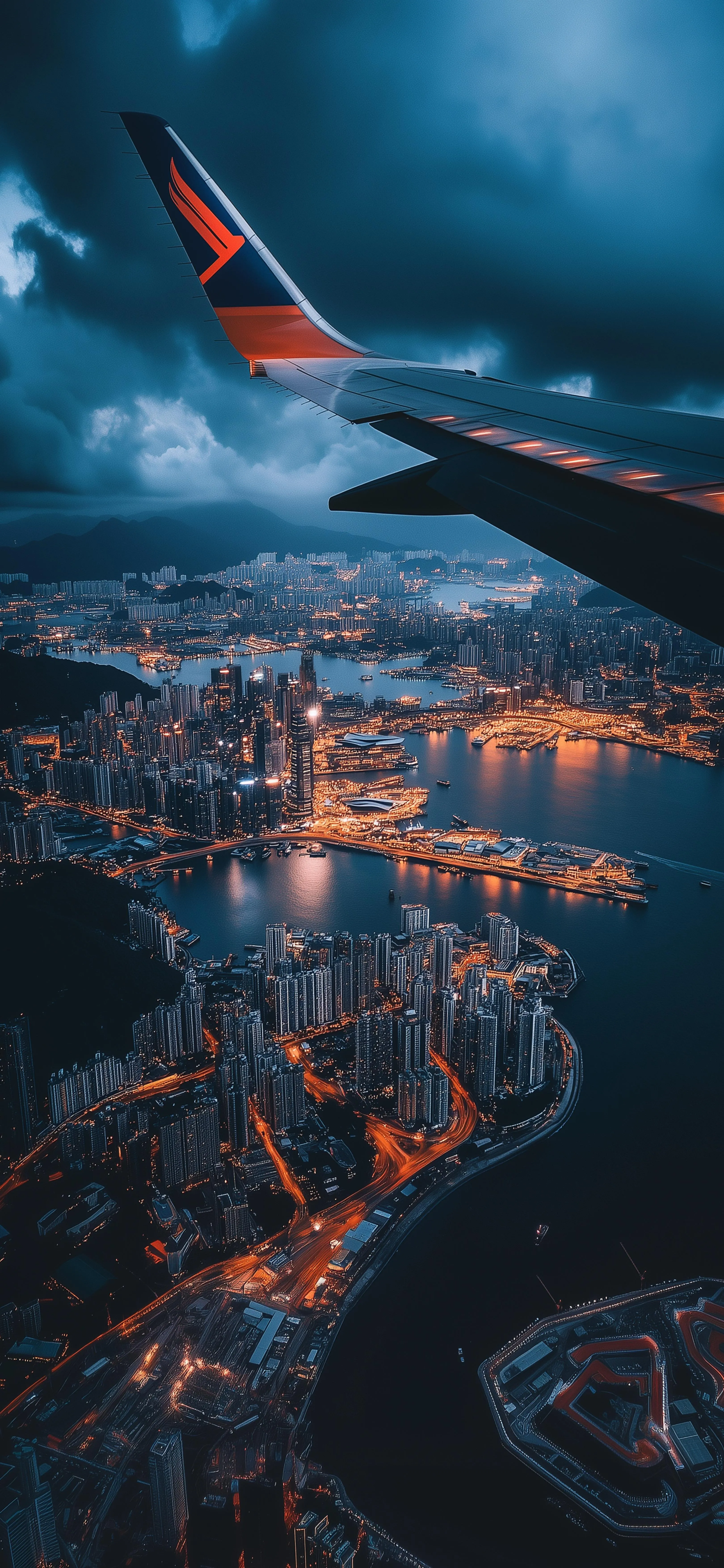 Cityscape from Airplane Window at Twilight Time Wallpaper