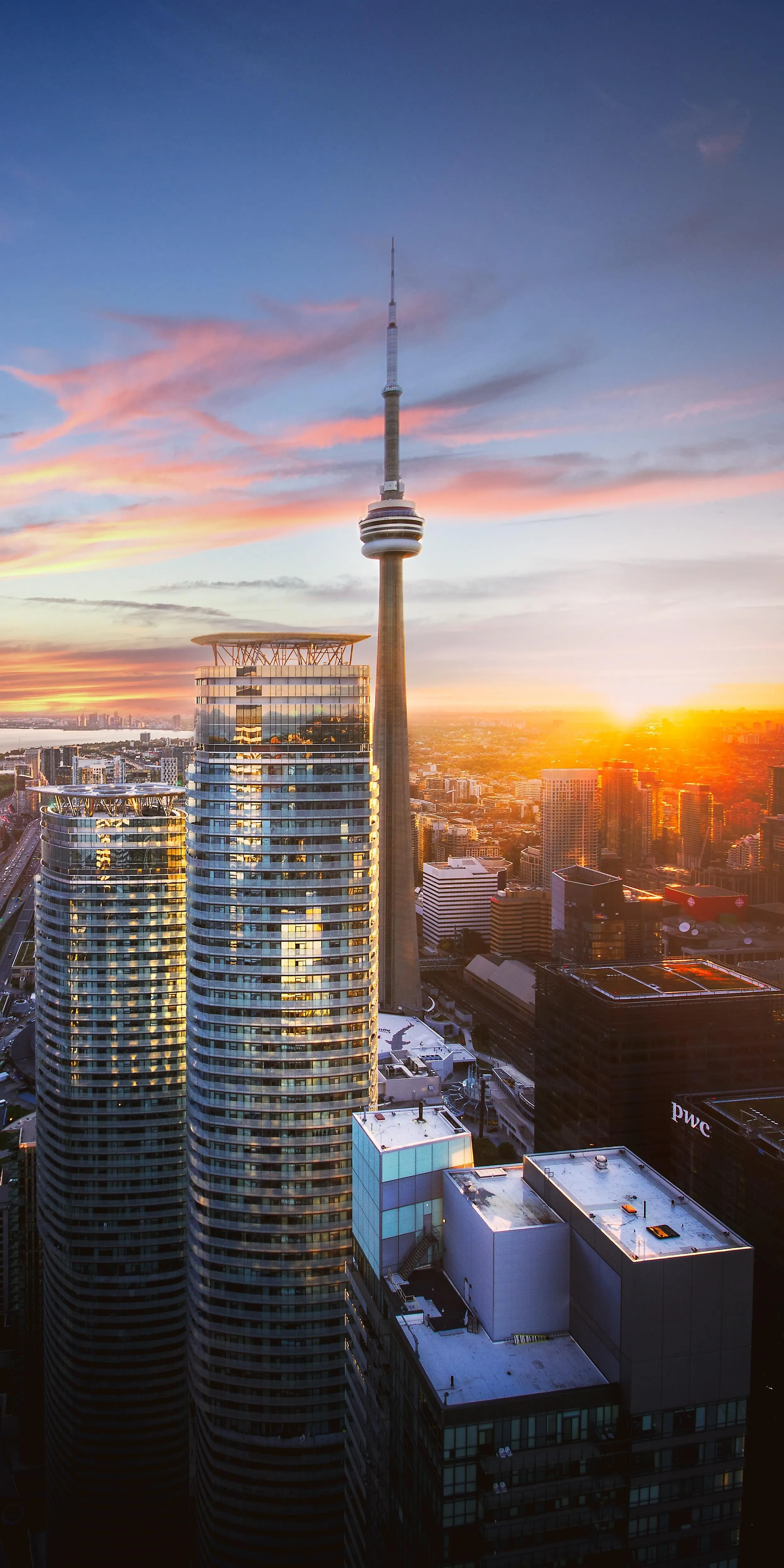 Cityscape with Tower at Sunset Golden Hour Free HD Wallpaper