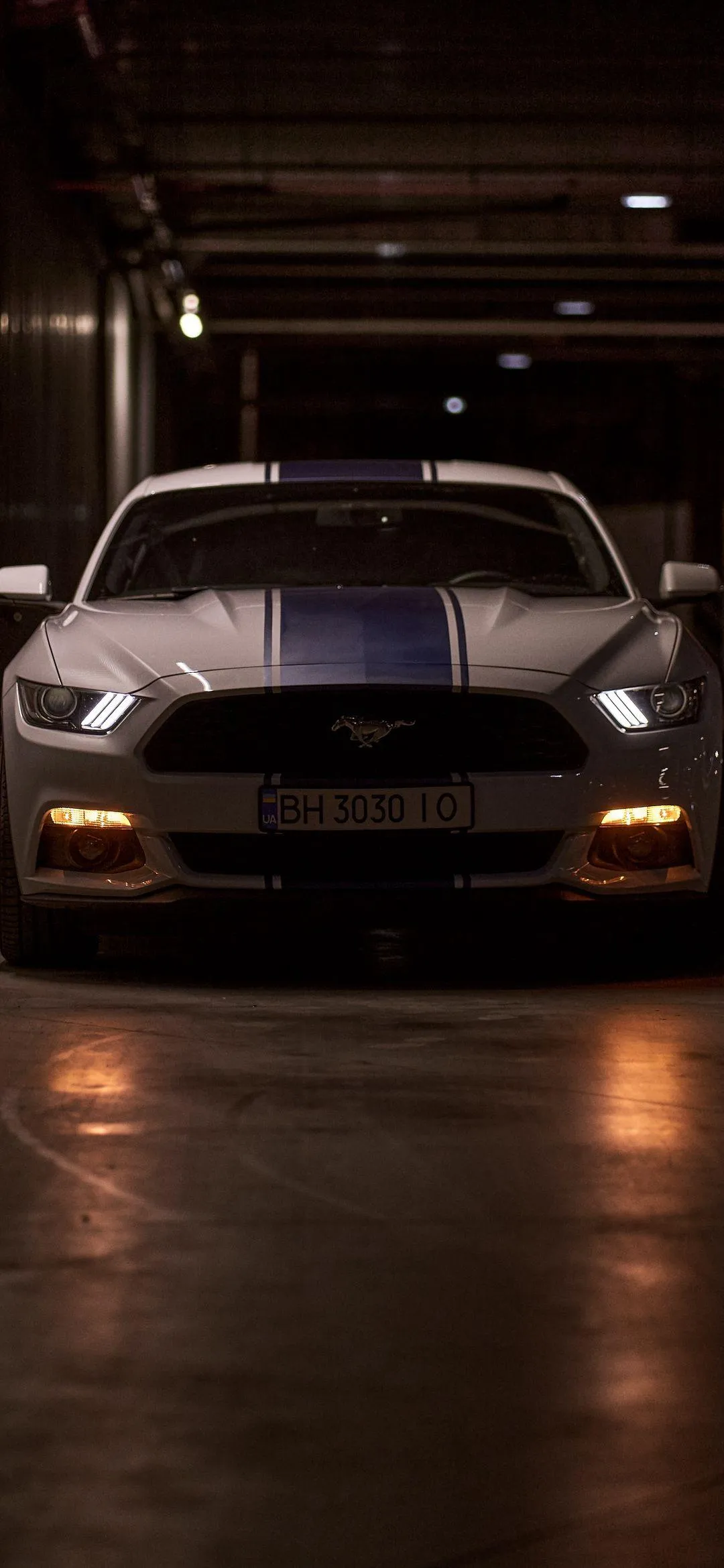Classic Car in Garage Dimly Lit Automotive Wallpaper