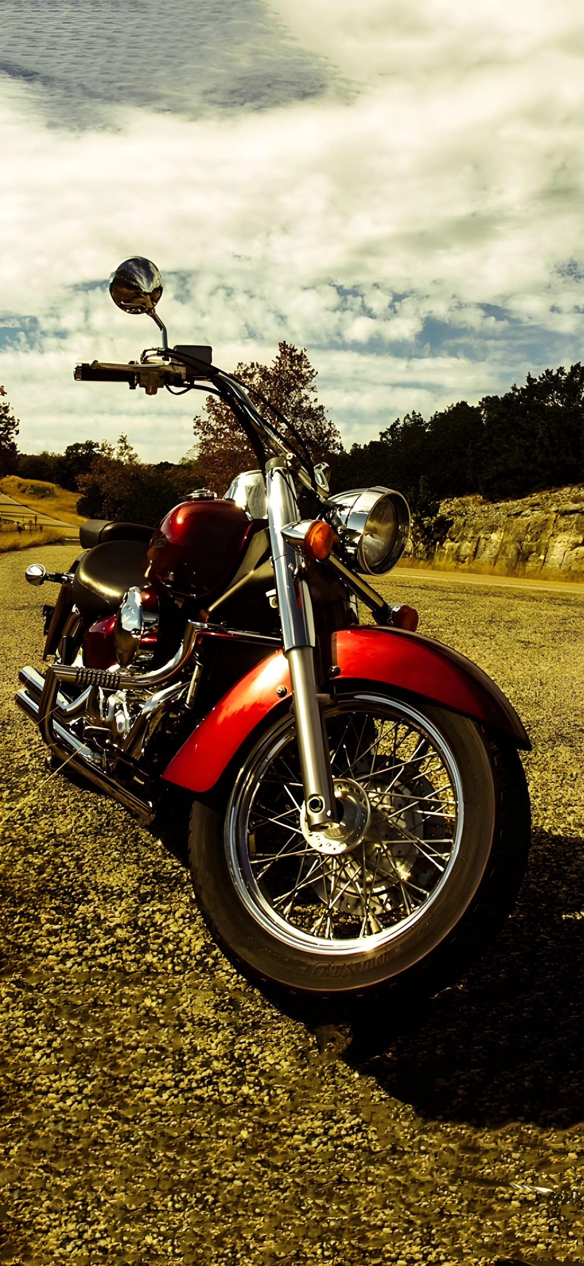 Classic Red Motorcycle Parked in Rural Dirt Road Scene