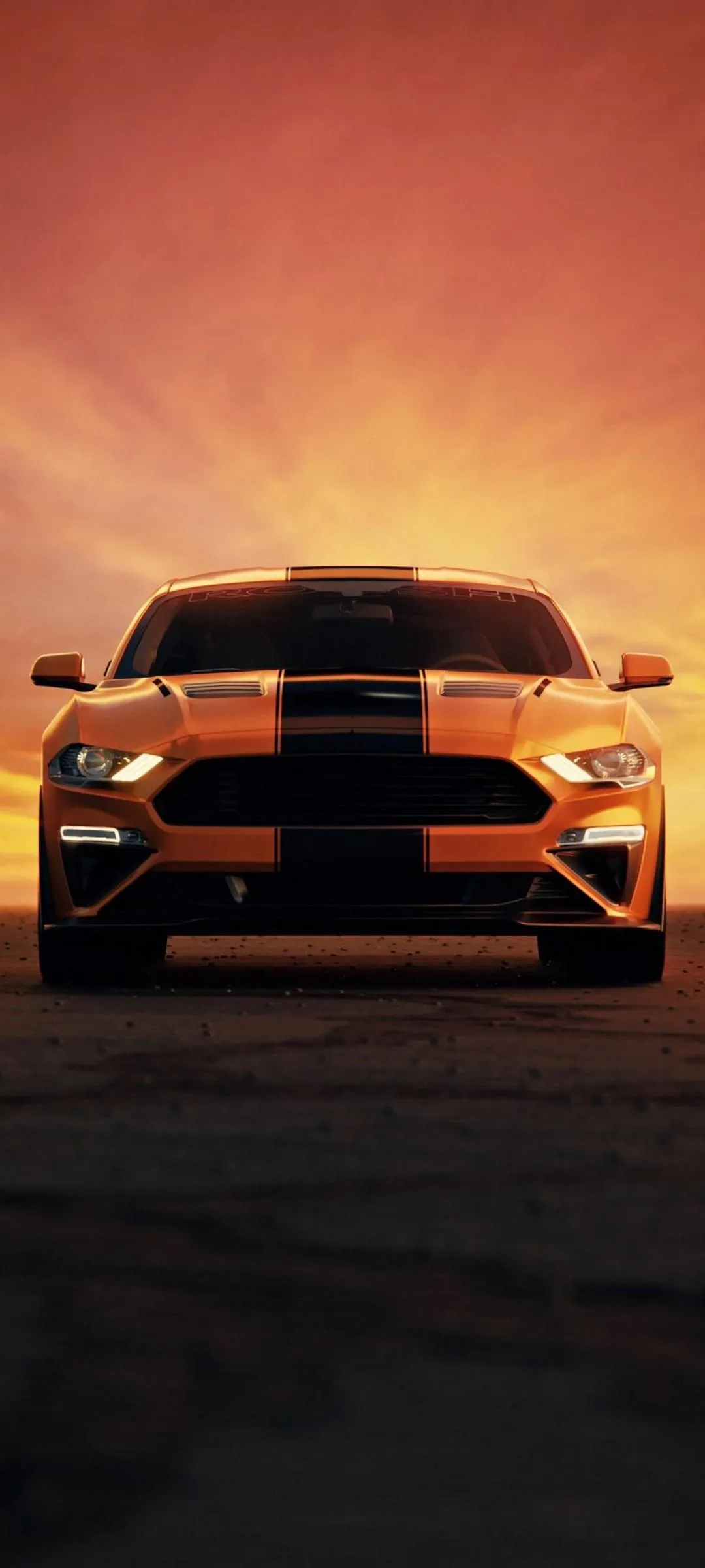 Classic Sports Car At Sunset In Desert Road Wallpaper