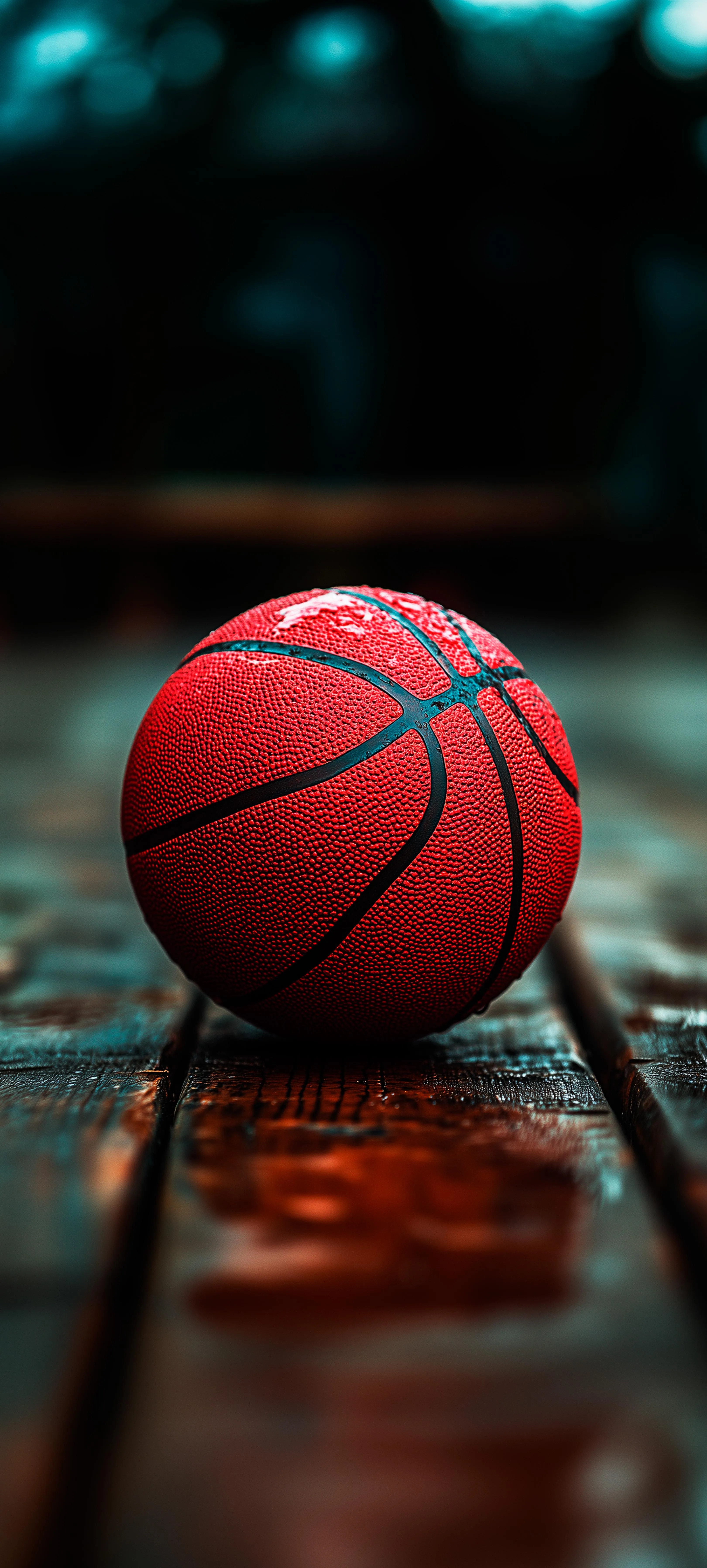 Close Up of Basketball on Wooden Floor with Blur Backdrop