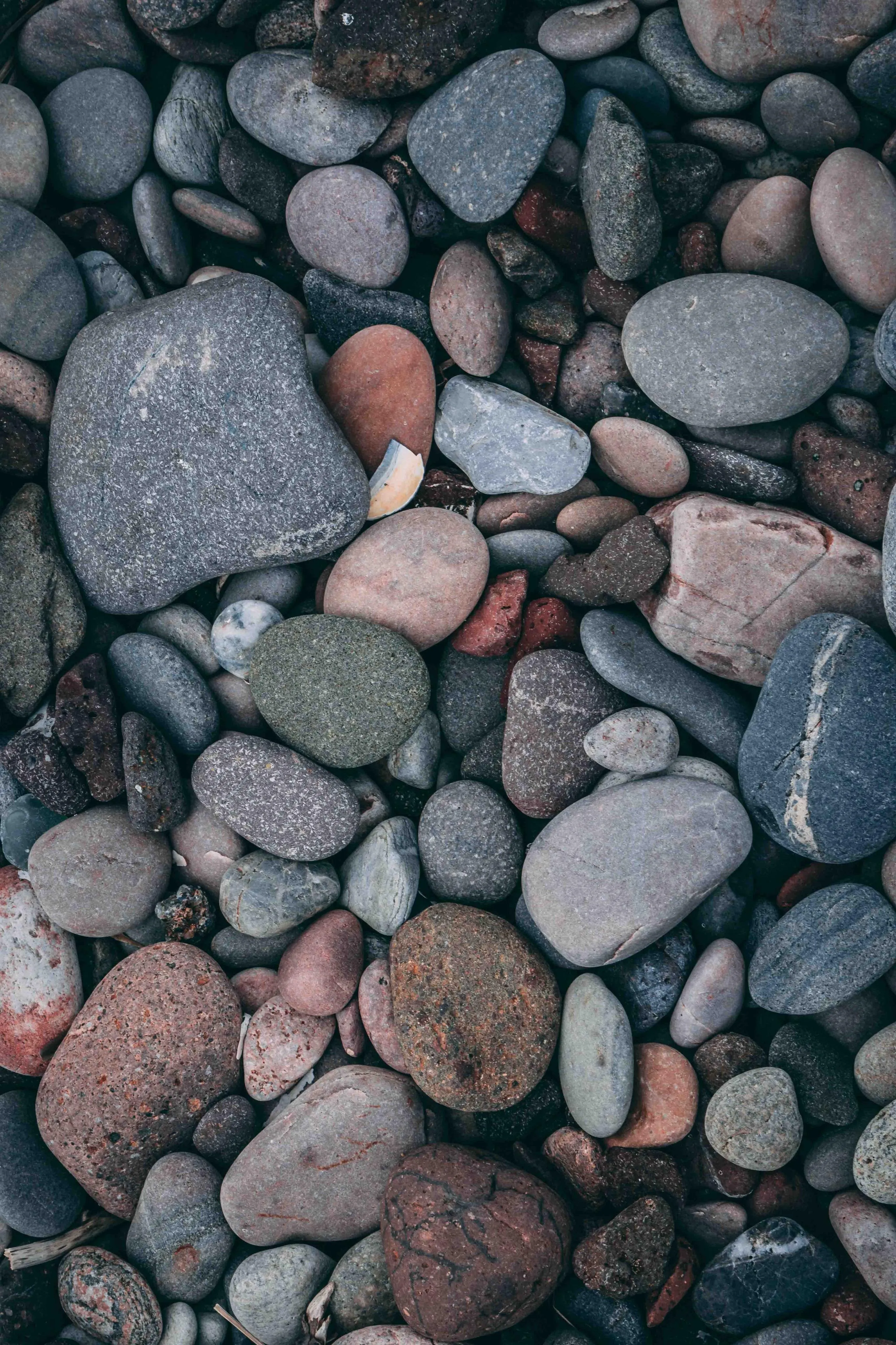 Close Up View of Natural Stones and Pebbles Mobile Wallpaper
