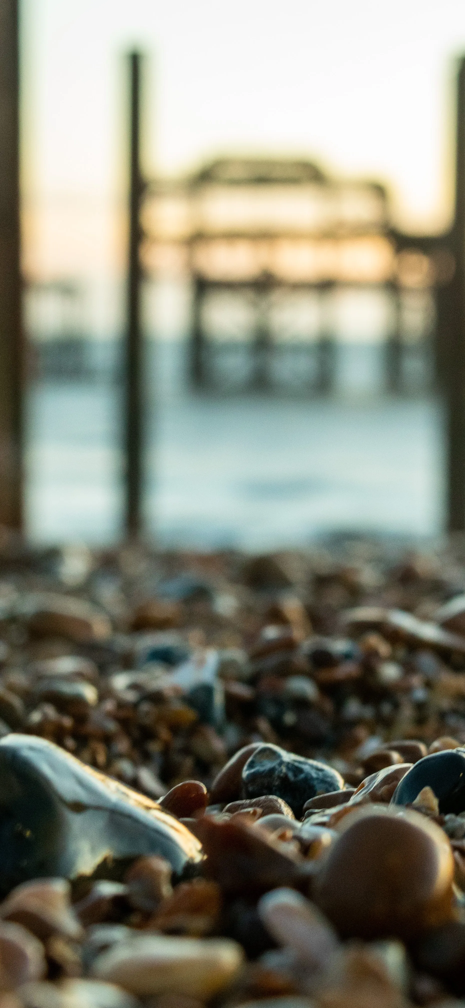 Closeup of Pebbles on Beach at Sunset Wallpaper for Oppo