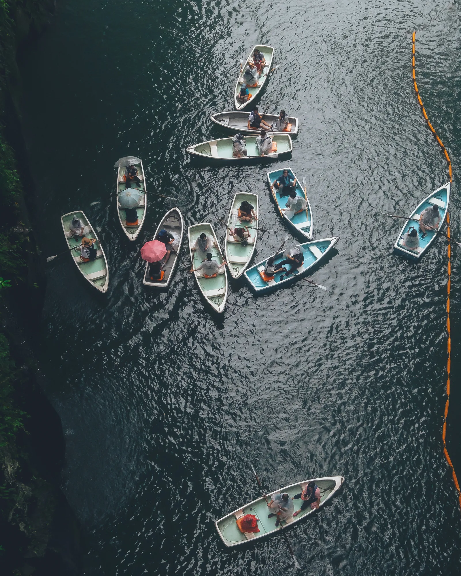Colorful Boats Floating in Still Blue Harbor Wallpaper HD