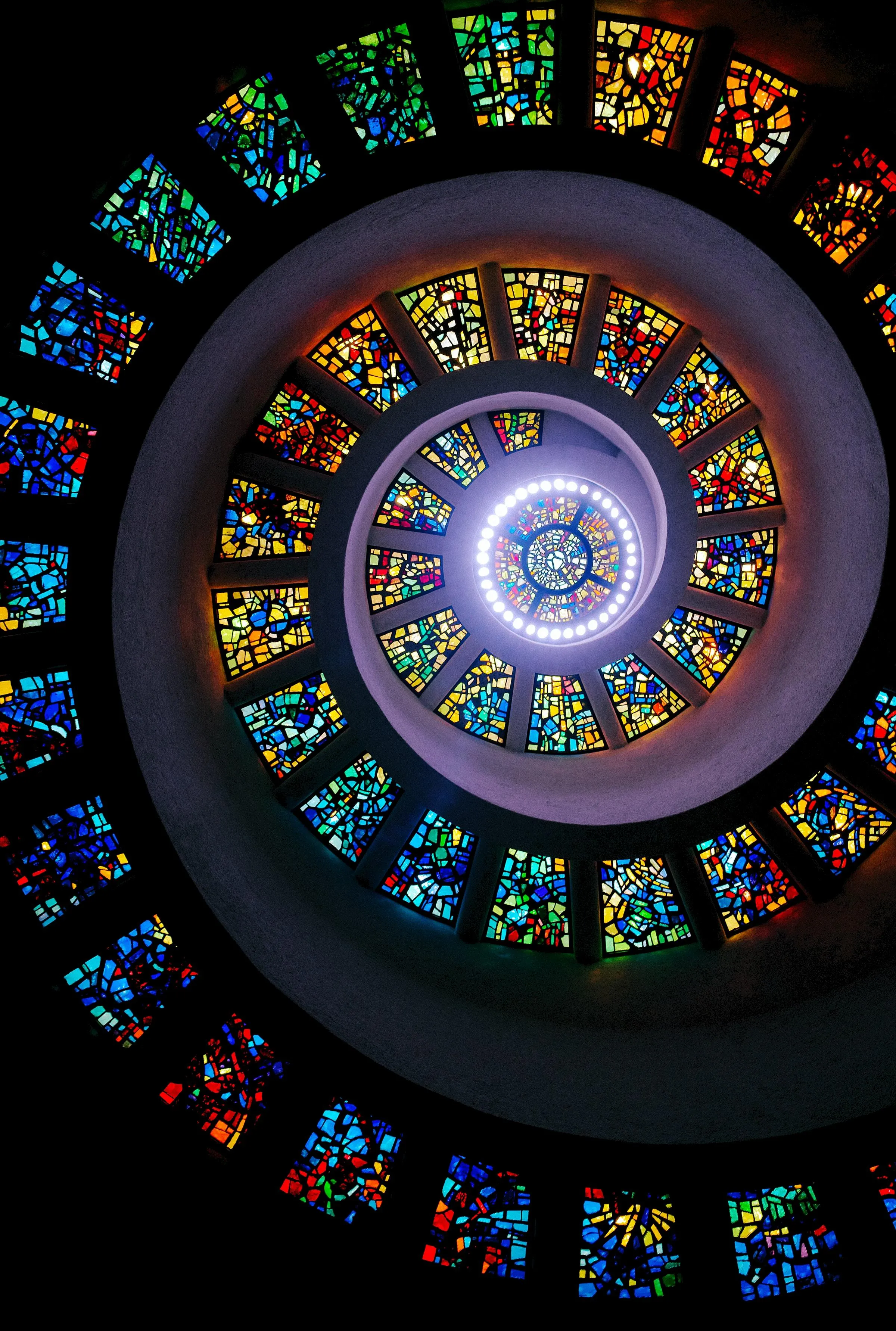 Colorful Spiral Stained Glass Window Showing Intricate Patterns