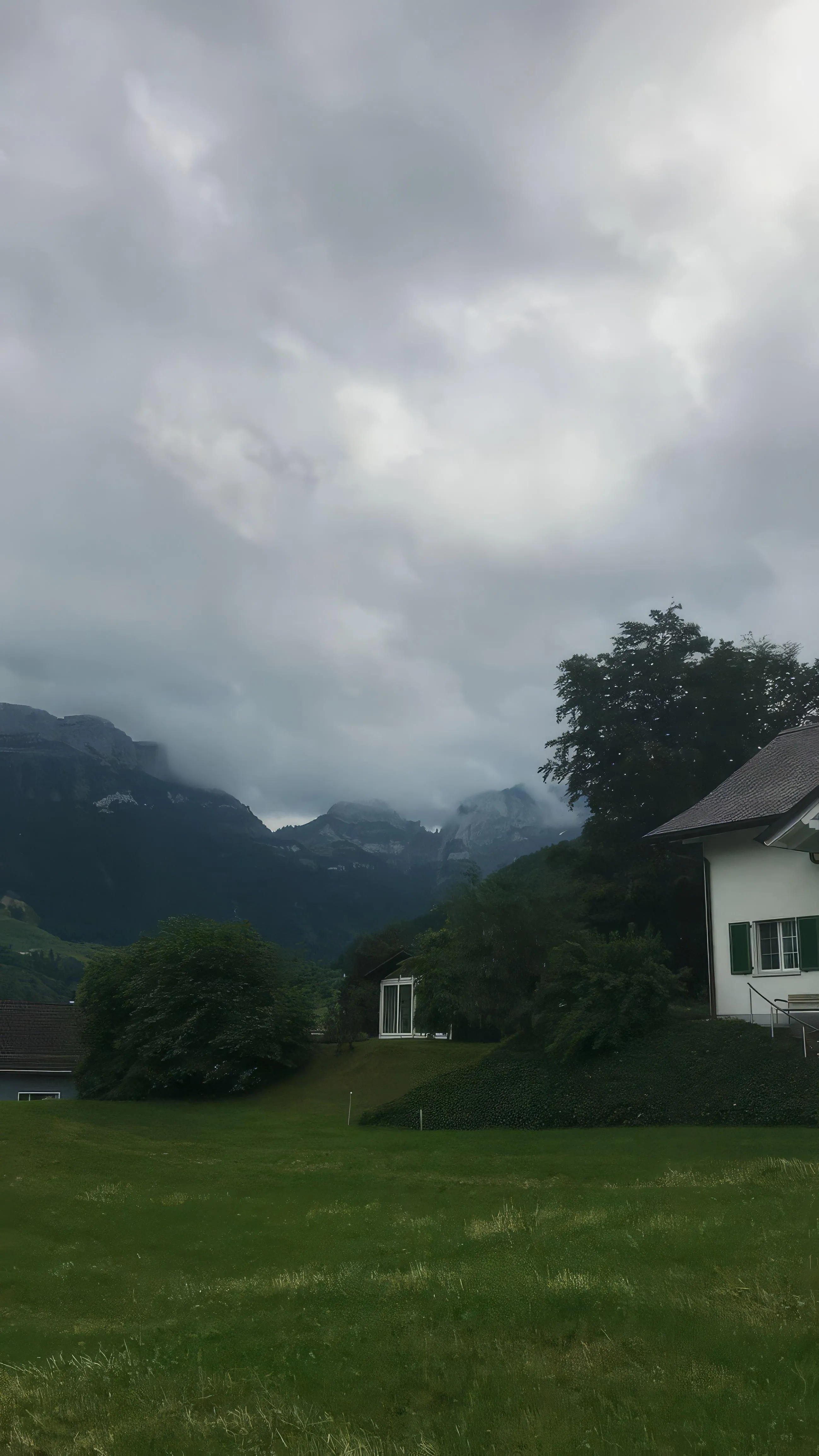 Countryside House Under Cloudy Sky in Nature Scene Wallpaper
