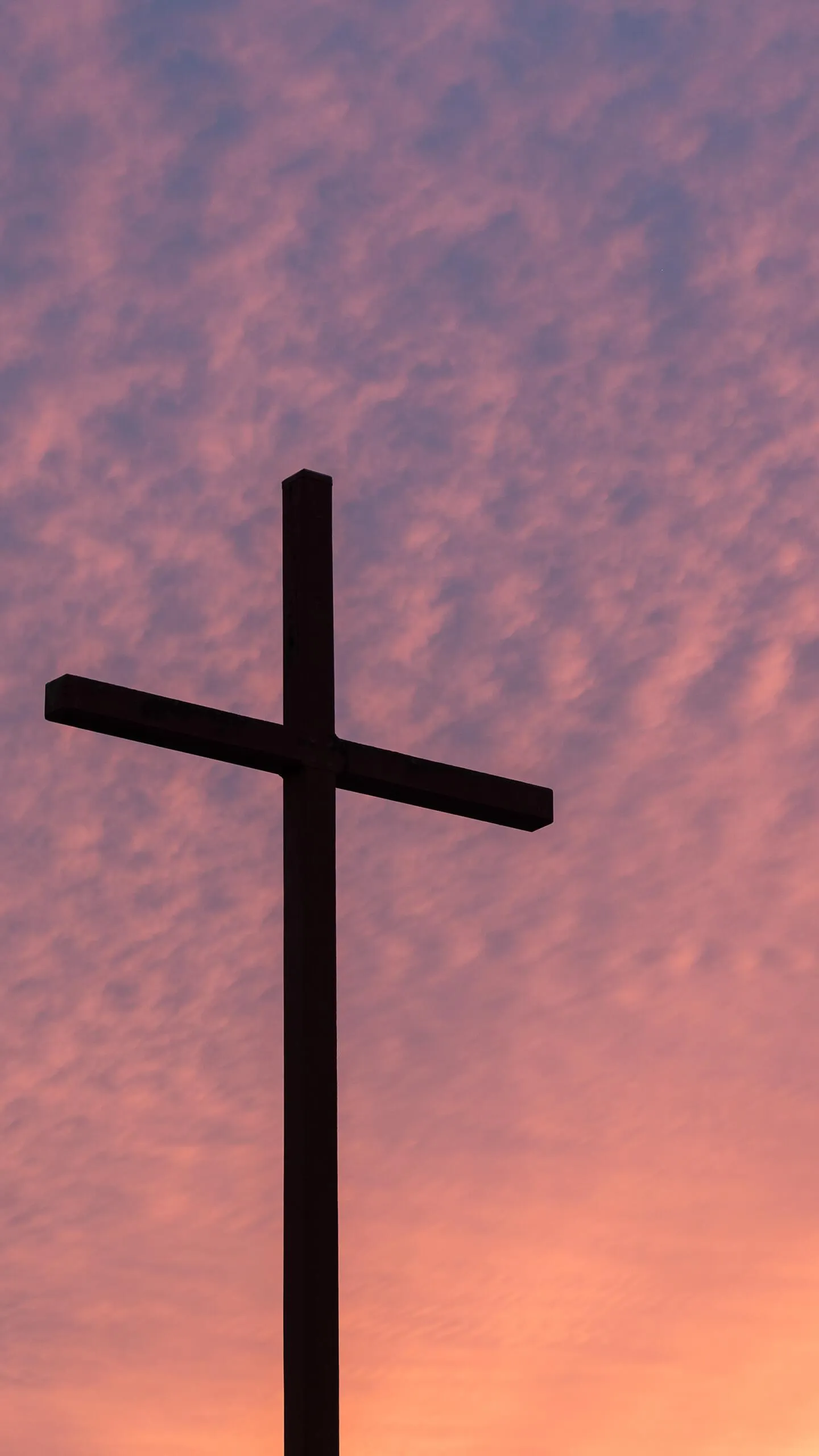 Cross Silhouette Against Serene Sunset Sky Scene Wallpaper