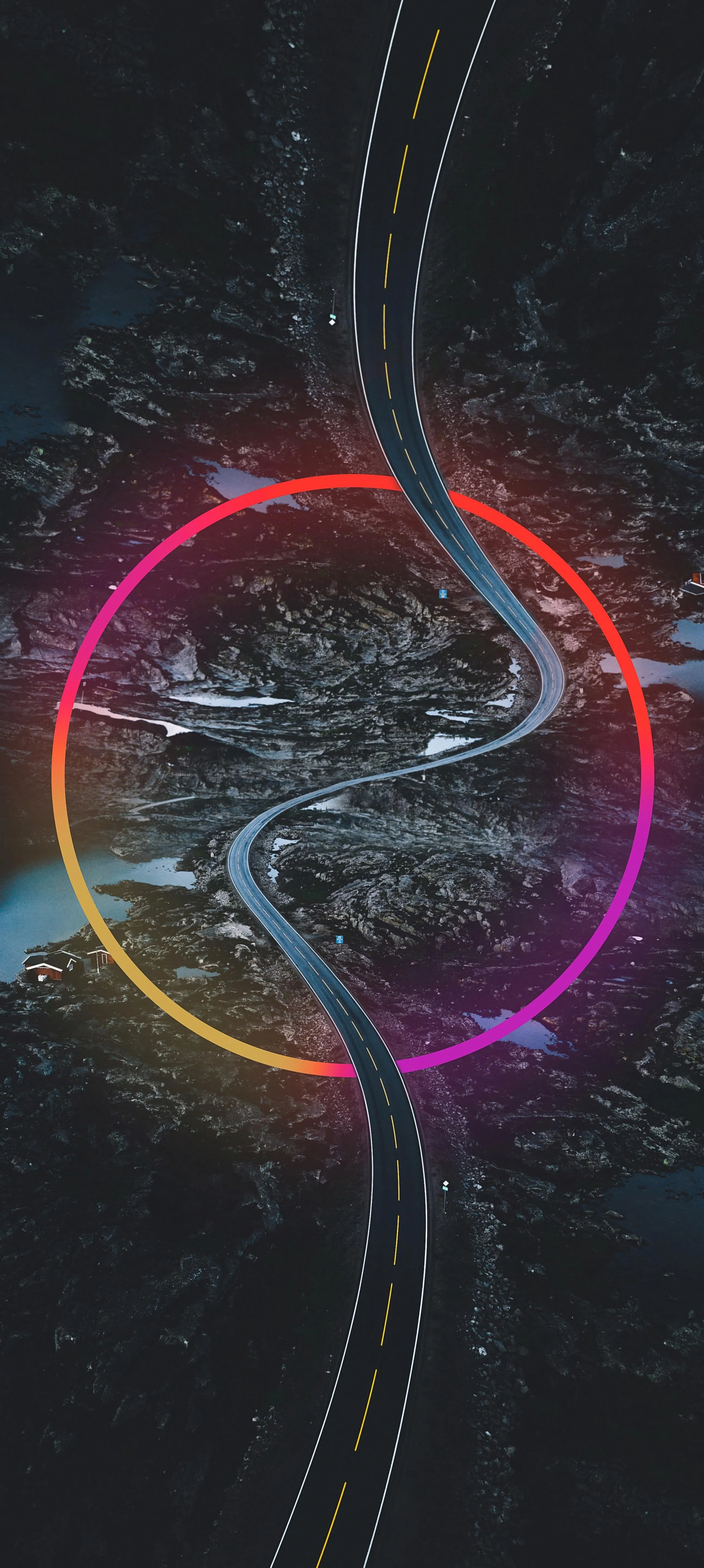 Curved Mountain Road with Glowing Colorful Circular Light