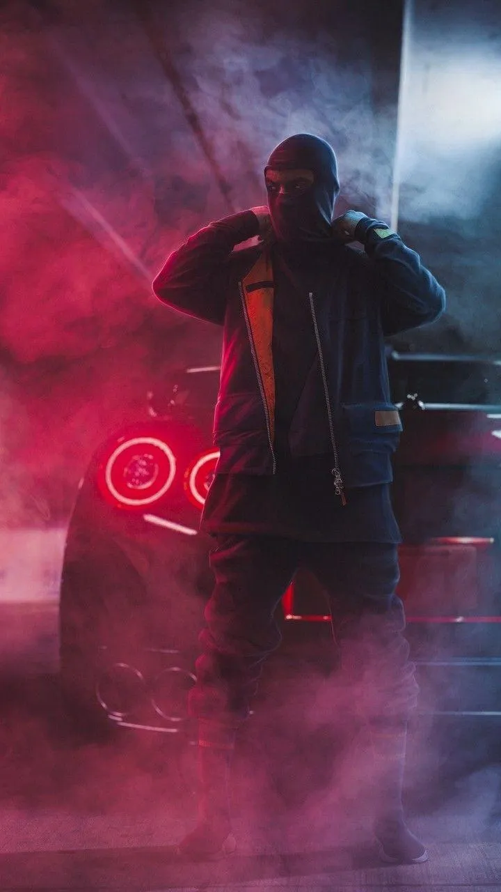 Cyberpunk Character with Red Neon Street Lights Wallpaper