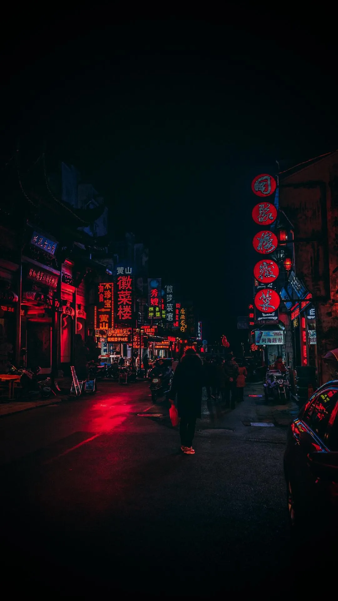 Cyberpunk City Street With Neon Red Reflections Wallpaper