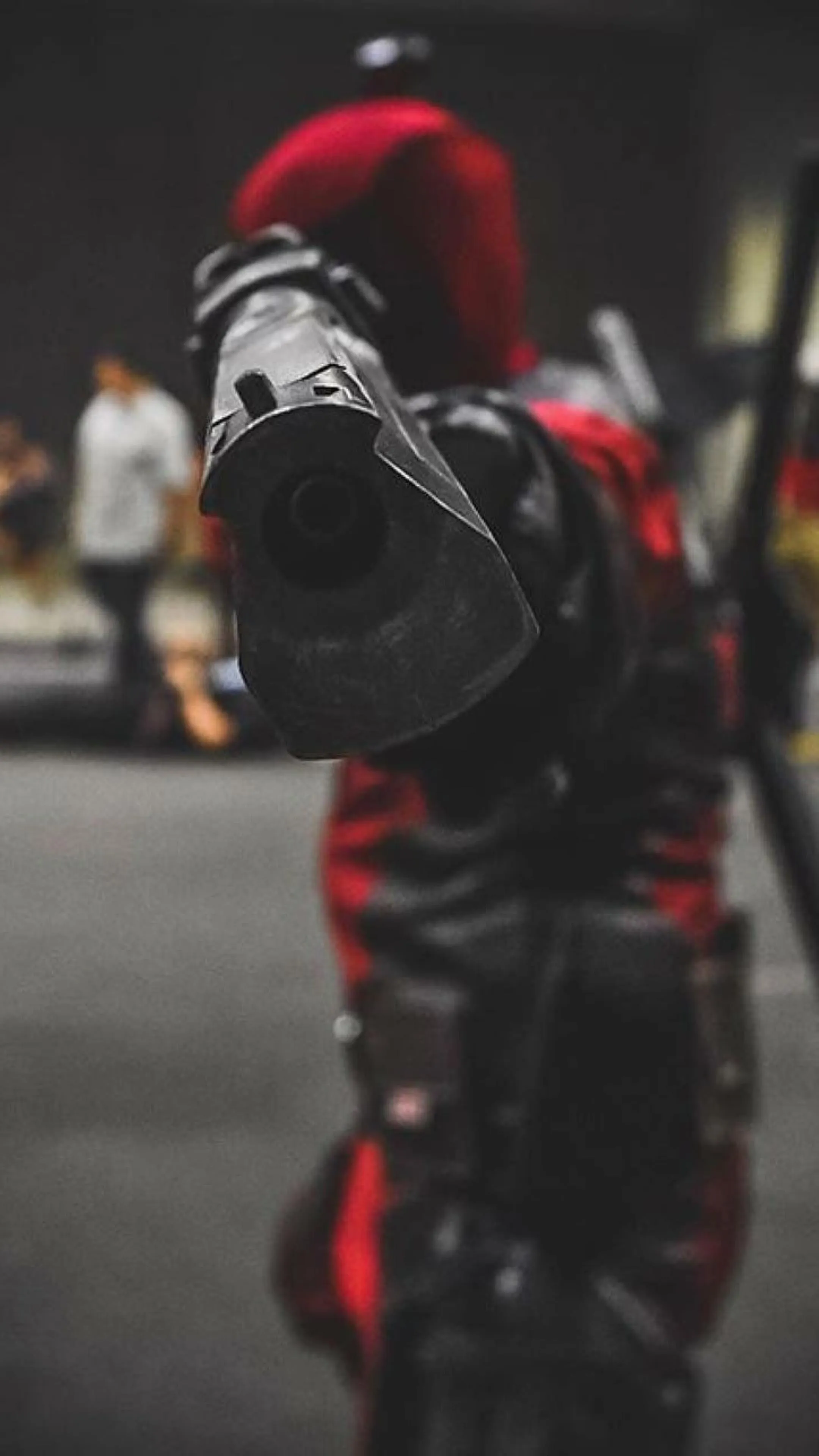 Dark Armored Soldier Standing Ready In Neon City Streets