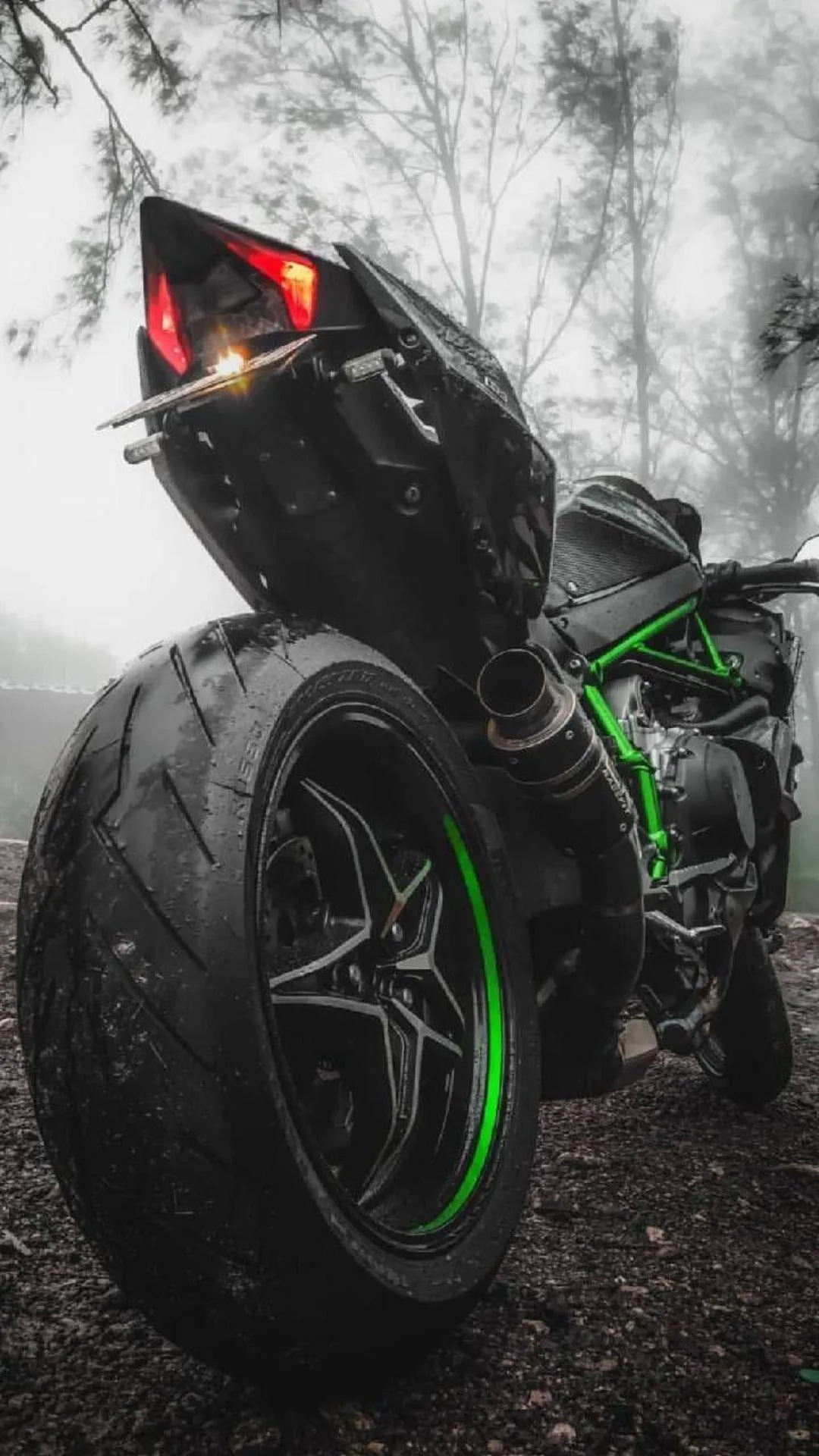Dark Motorcycle Framed in Rain with Green Neon Accents