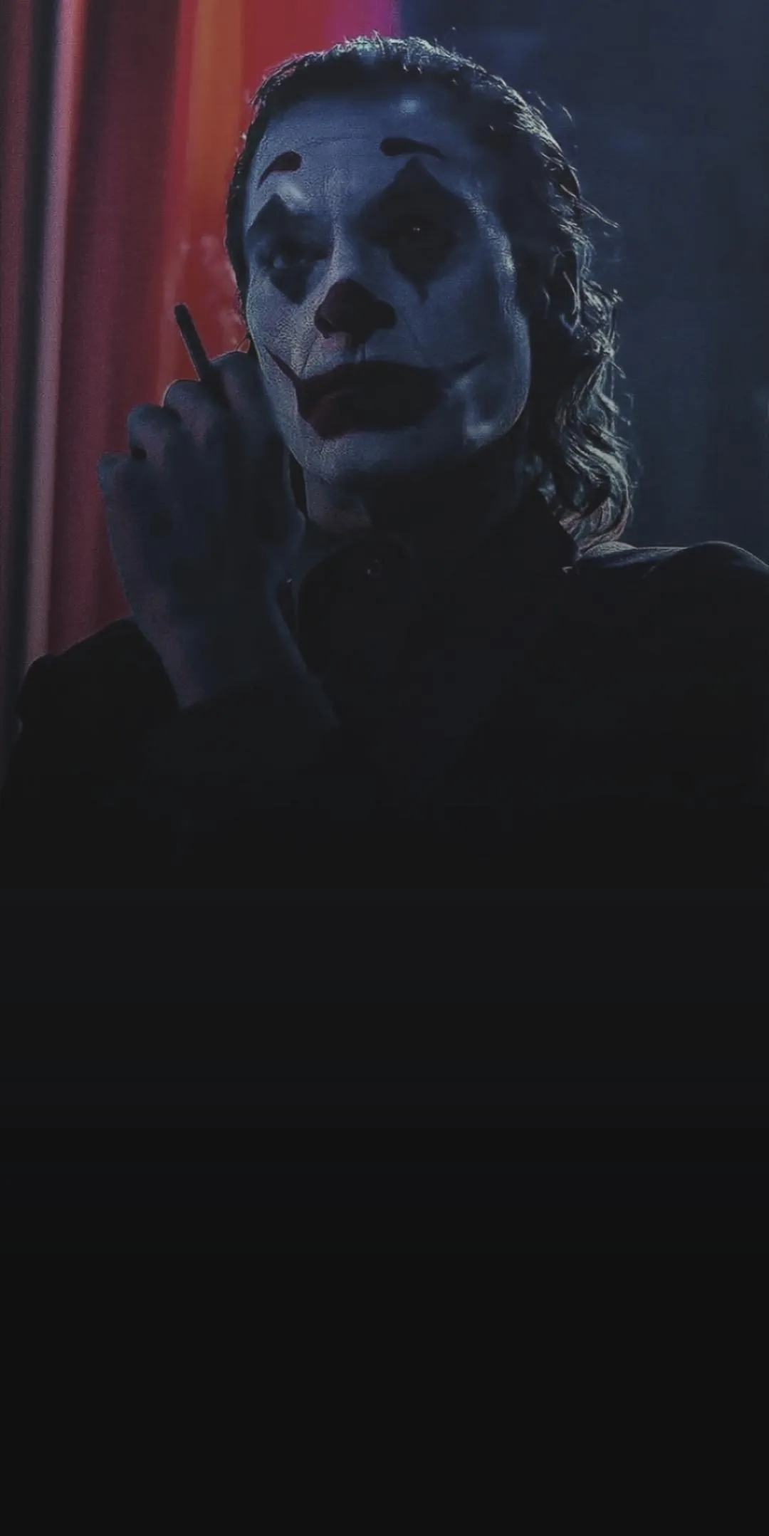 Dark Portrait of Mysterious Figure in Shadows Wallpaper