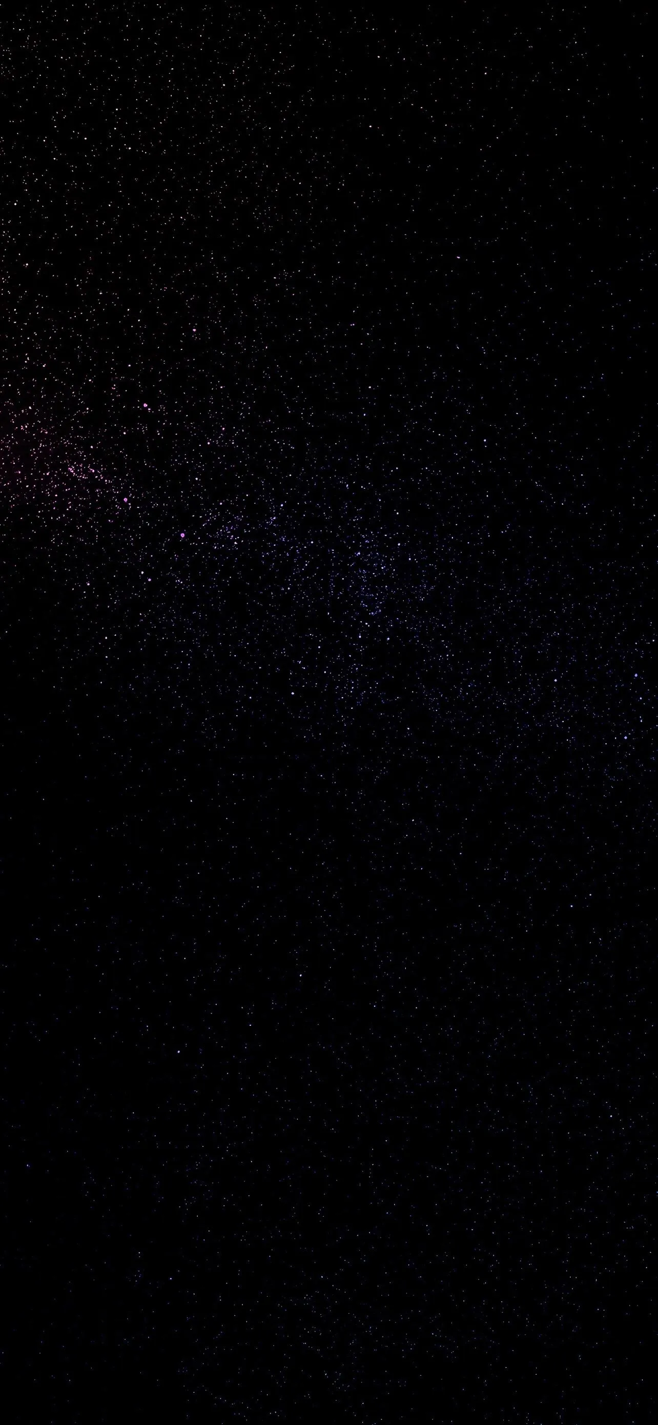 Dark Starry Space Background with Faint Purple Light Flares