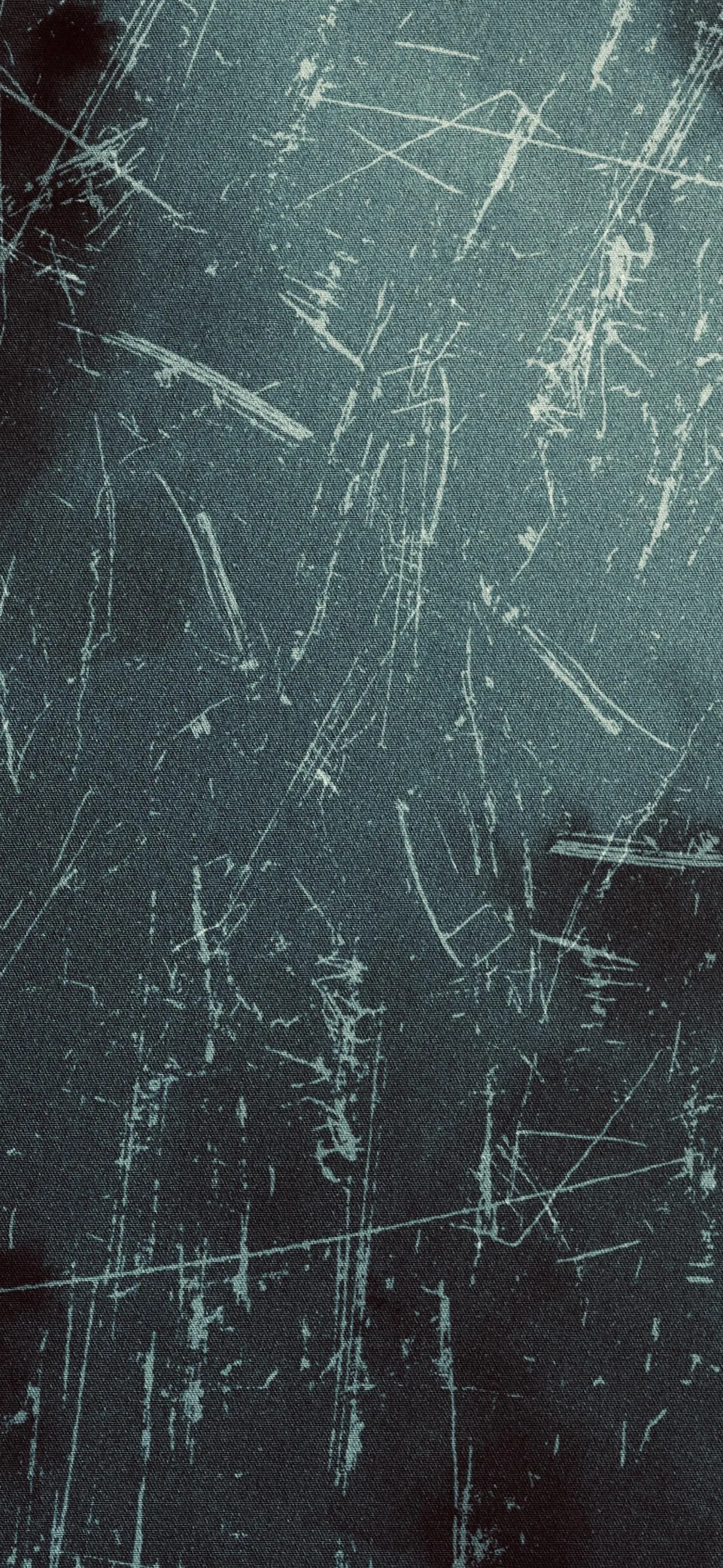 Distressed Scratched Texture on Faded Blue Denim Surface