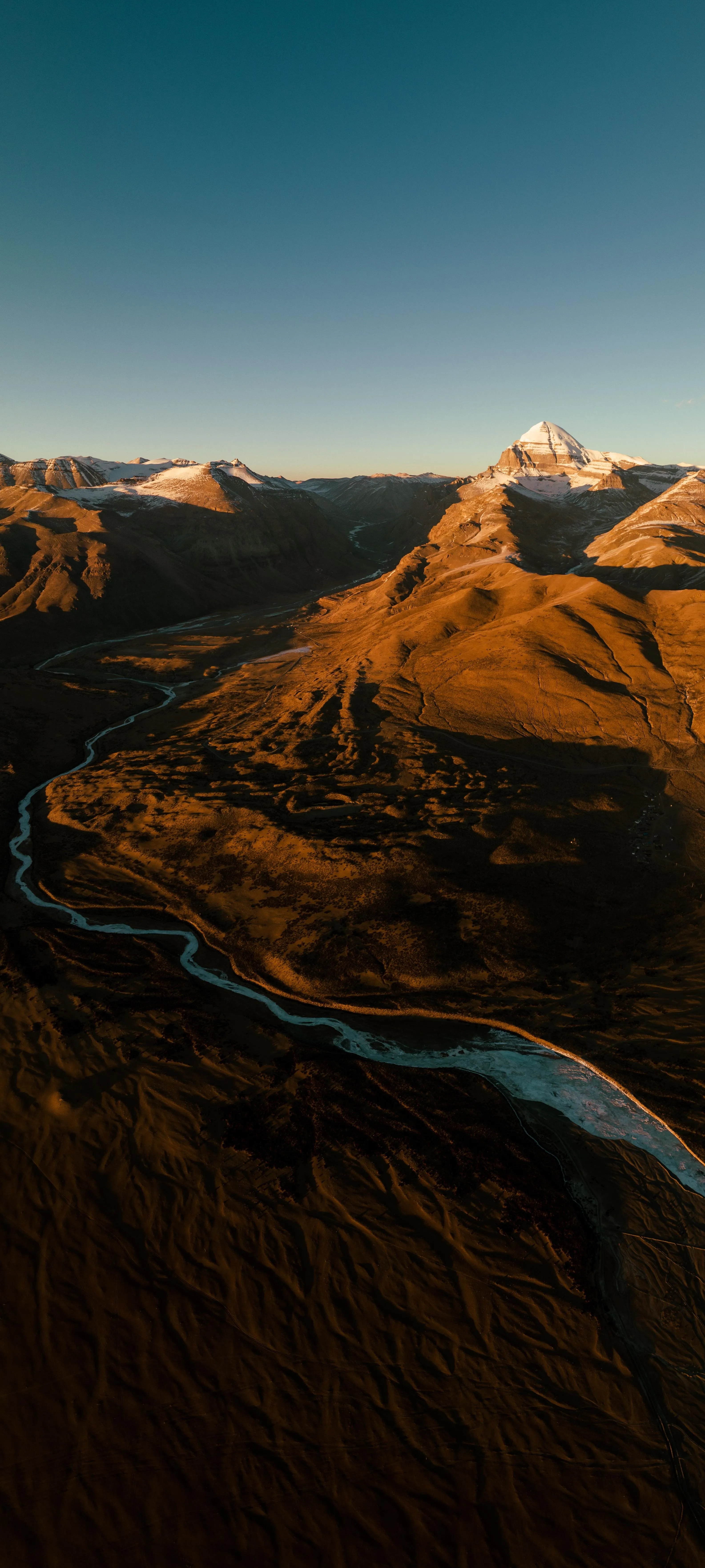 Dramatic Mountain Cliffs at Sunset with Ocean View Image