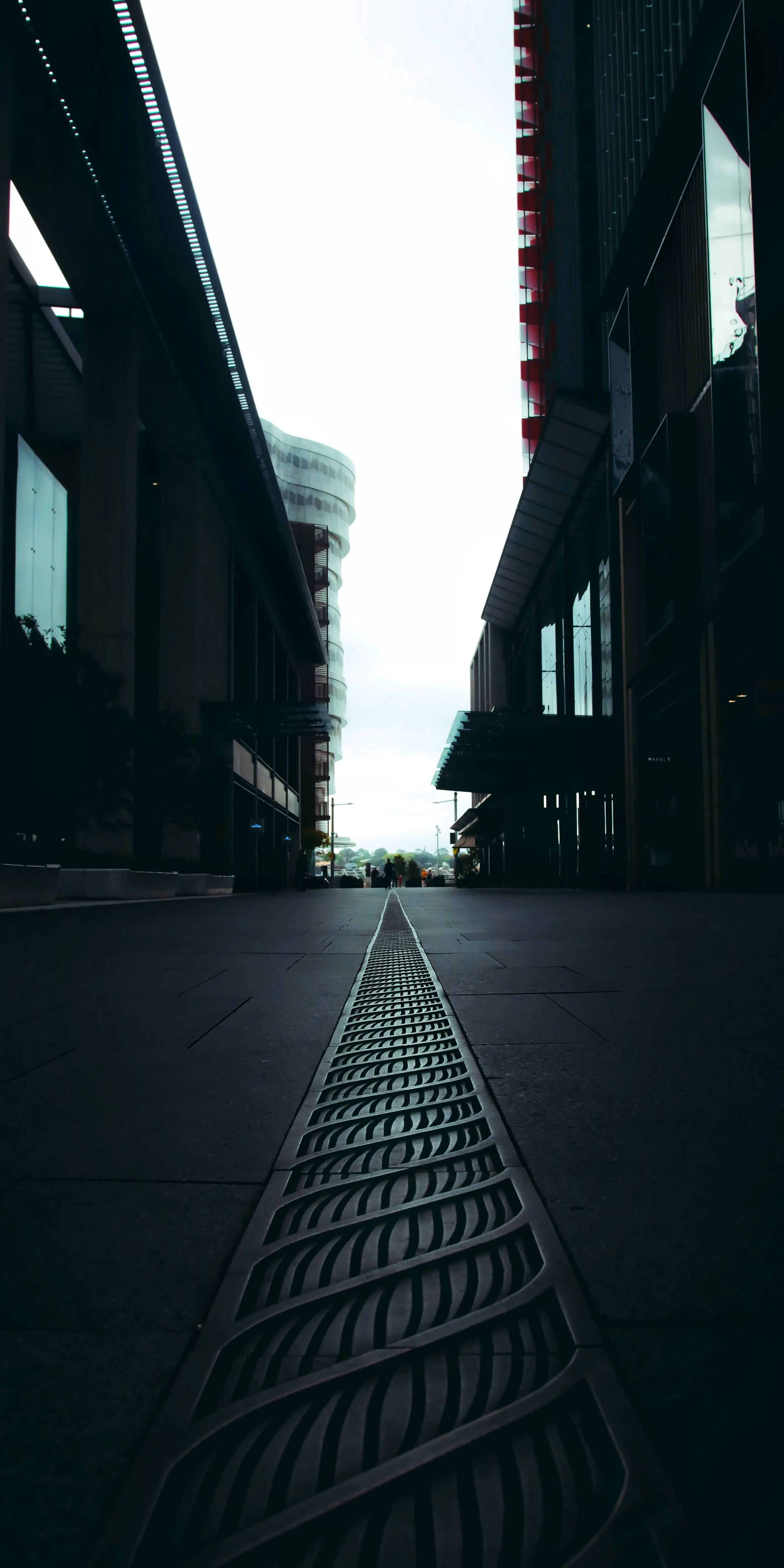 Dramatic Urban Alleyway Showing Light and Shadow Contrast