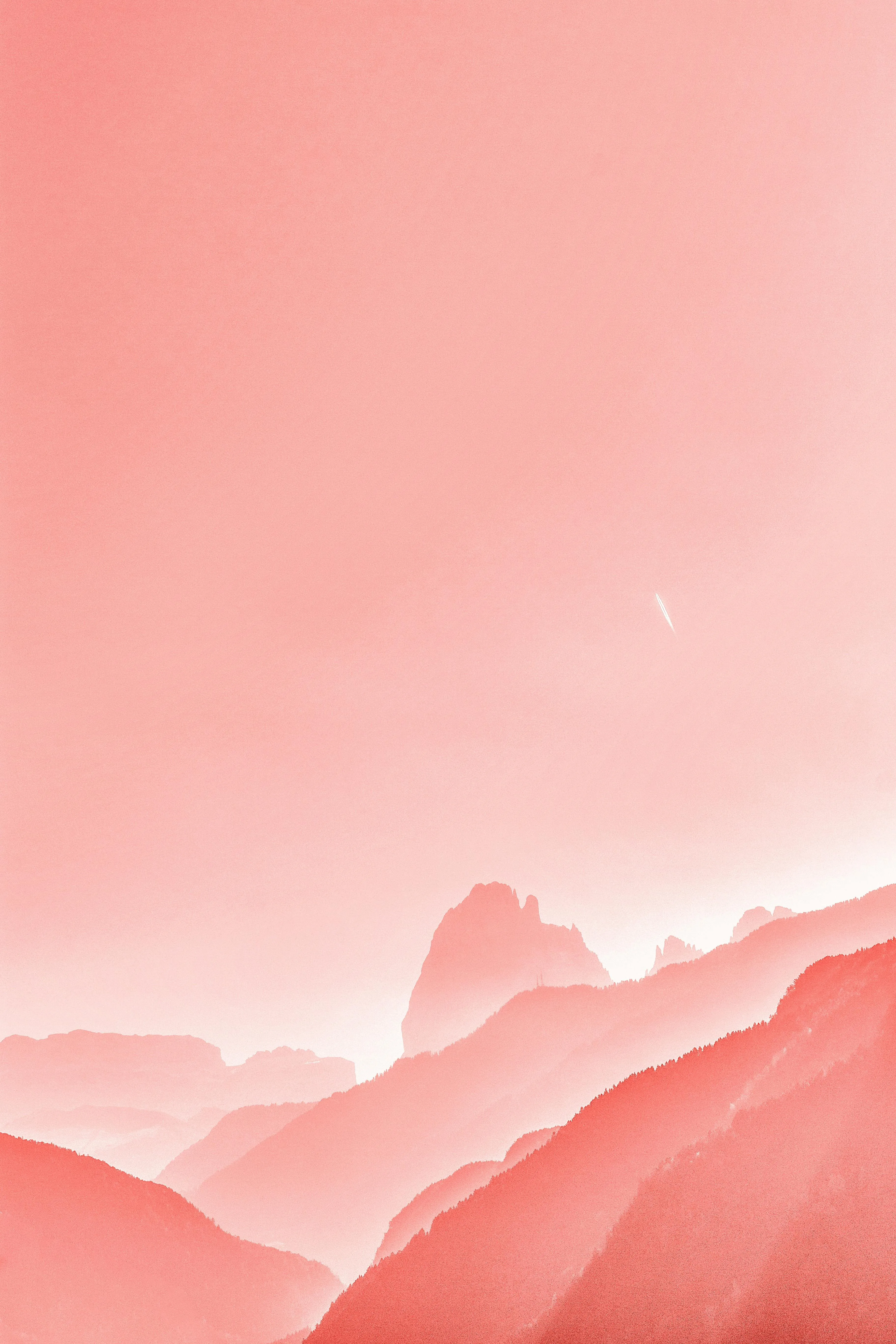 Elegant Soft Pink Hazy Mountain Layers Under Morning Sky