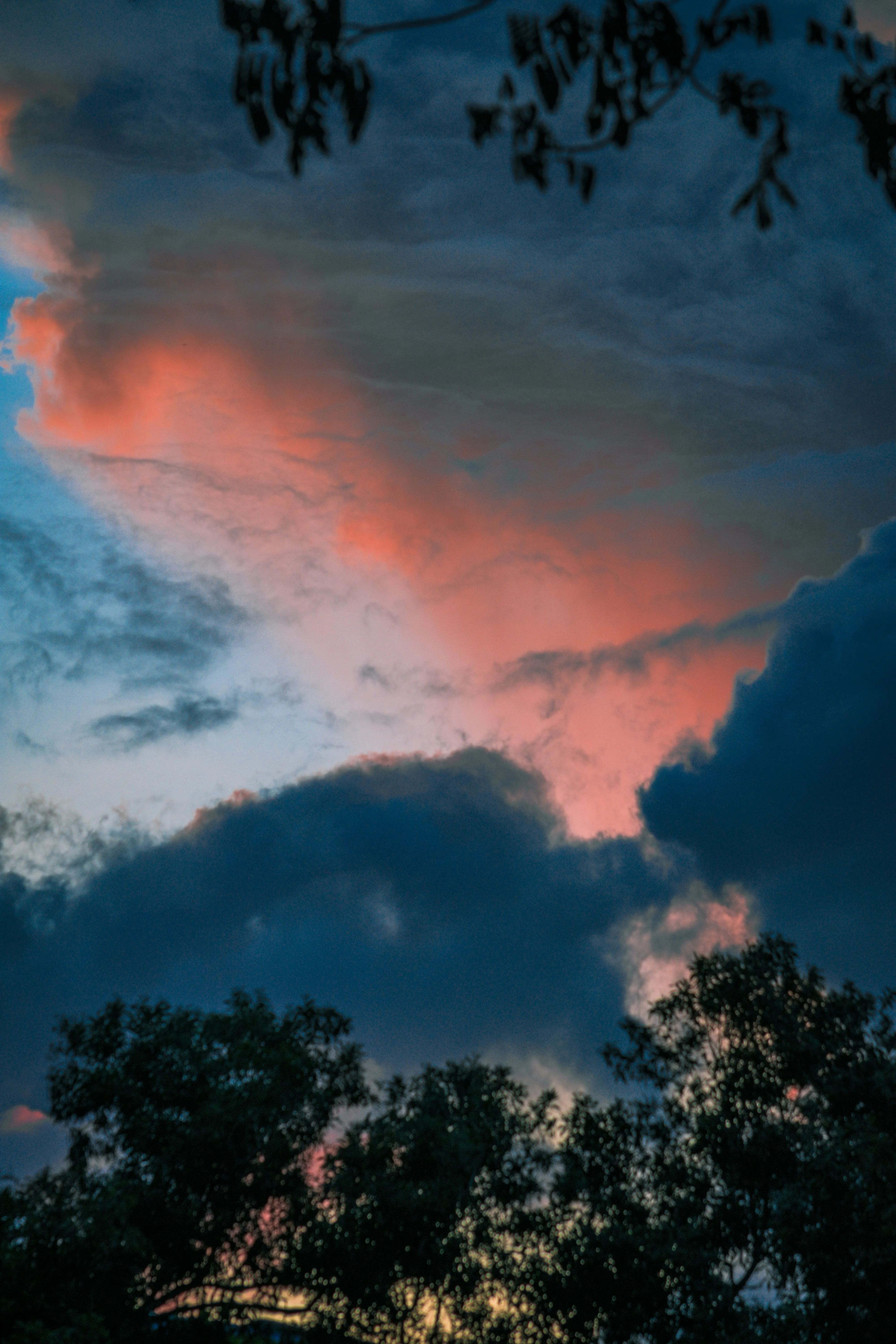 Evening Sky Painted With Fiery Red And Blue Clouds