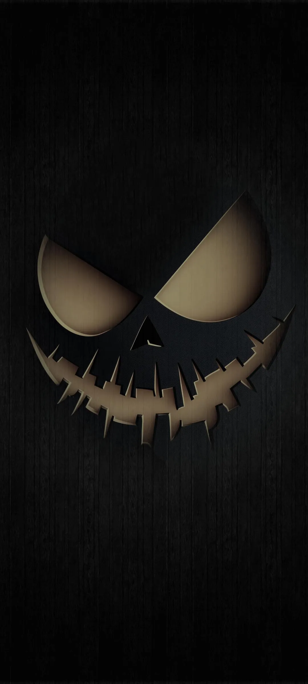 Evil Grinning Face Glowing in Black Darkness Wallpaper