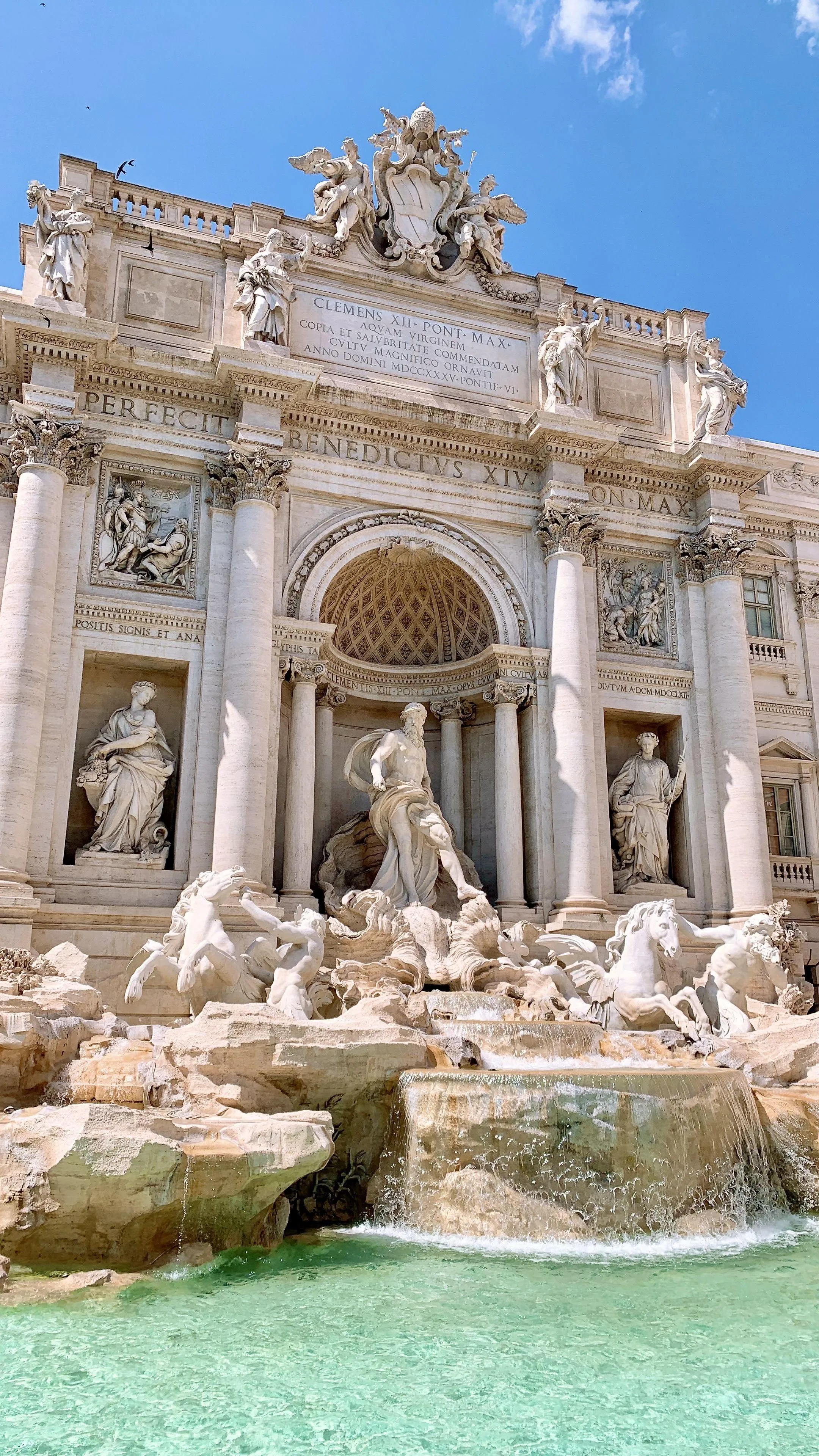Famous Historic Fountain Under Clear Blue Sky Wallpaper