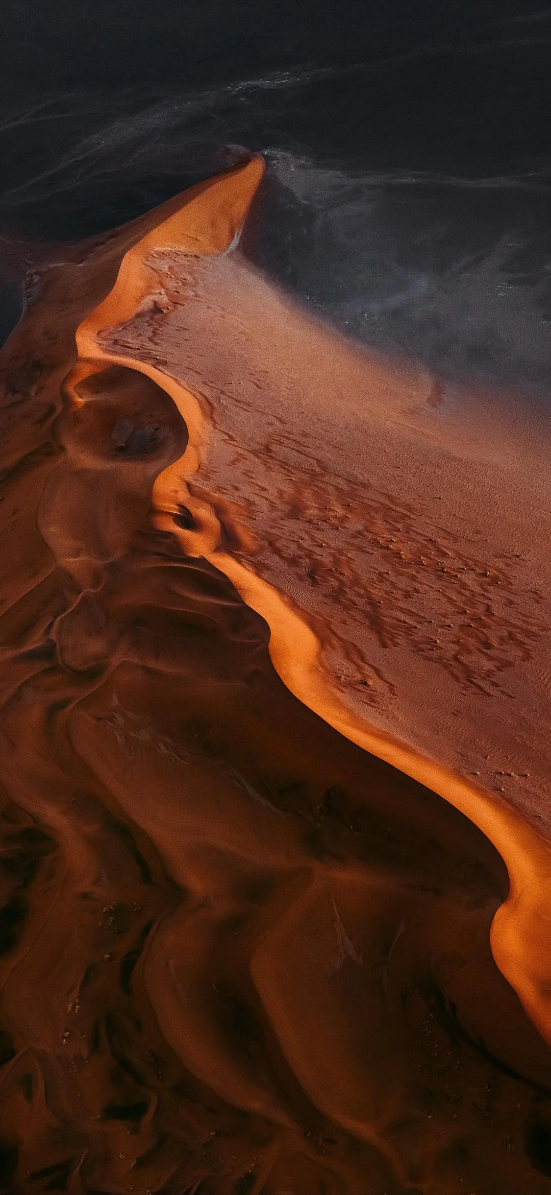 Fiery Desert Canyon Path Illuminated by Warm Orange Light
