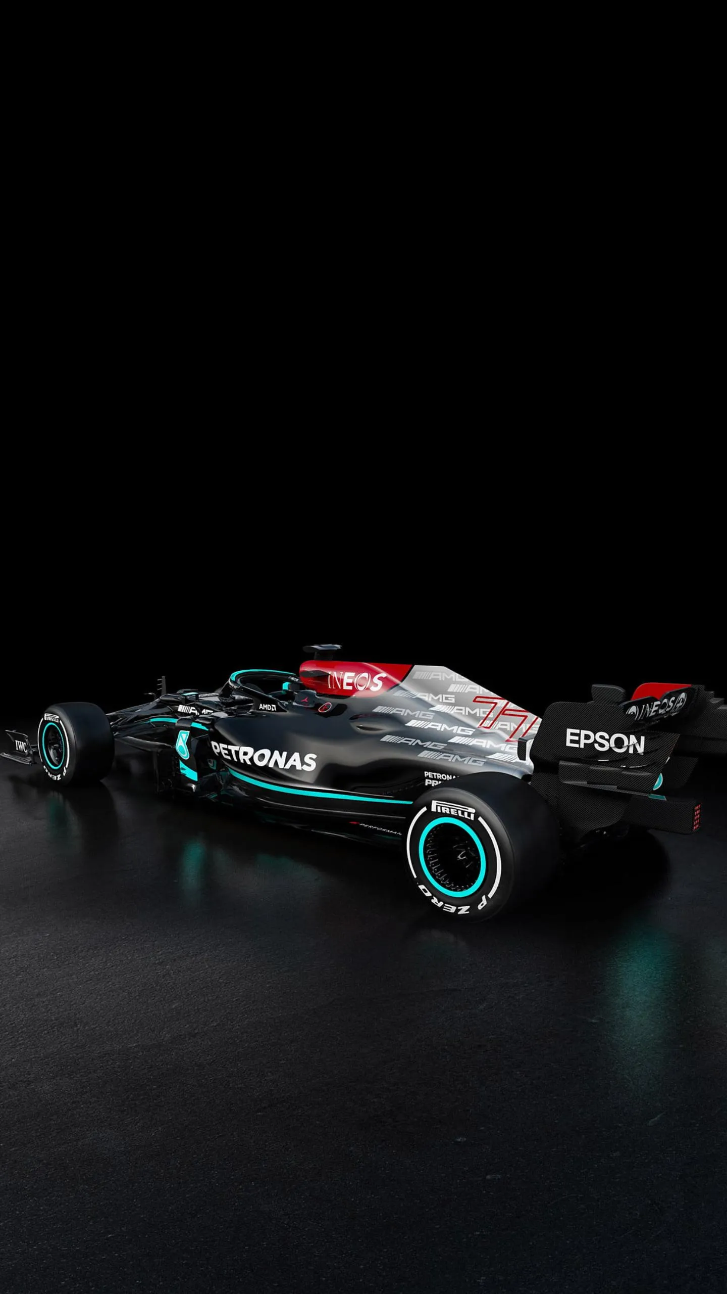 Formula One Race Car on Wet Asphalt at Night Wallpaper