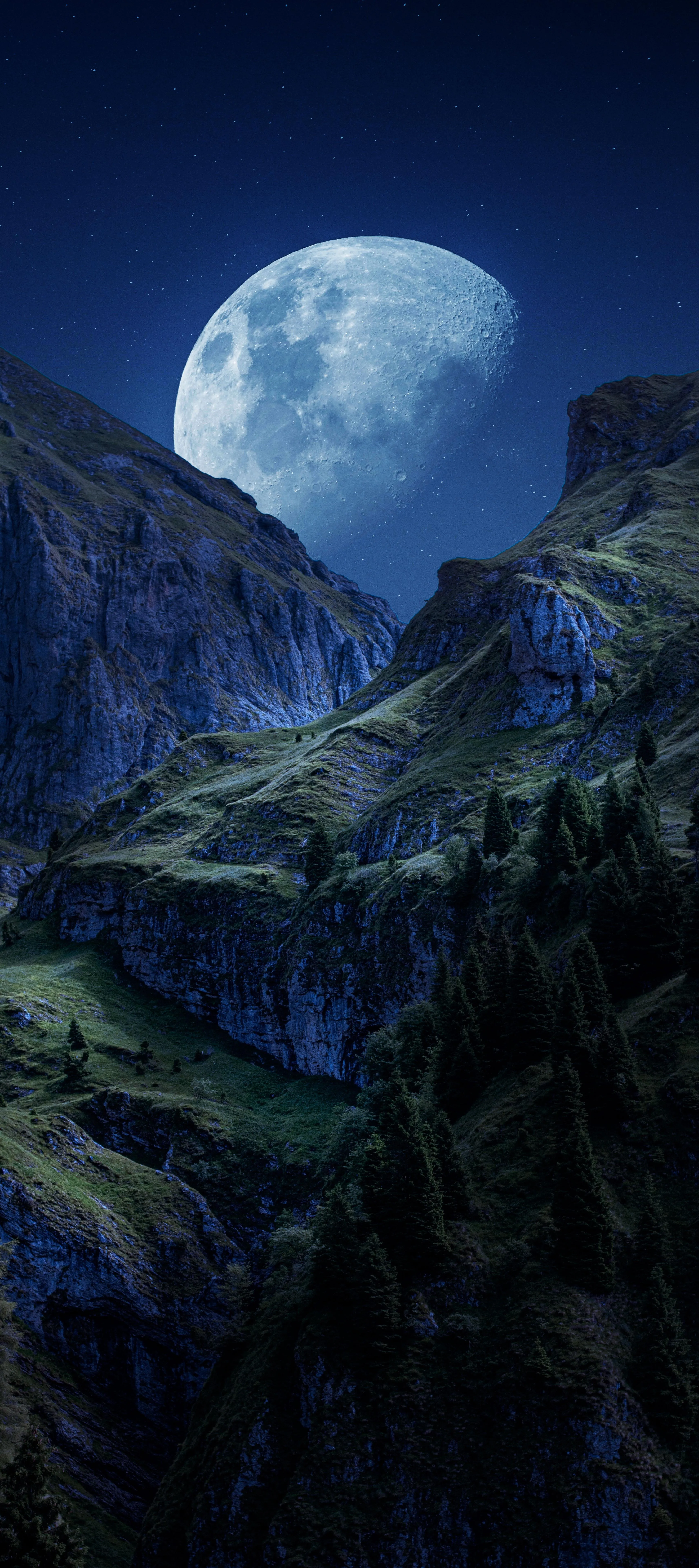 Full Moon Rising Over Mountain Peaks in Night Sky Image