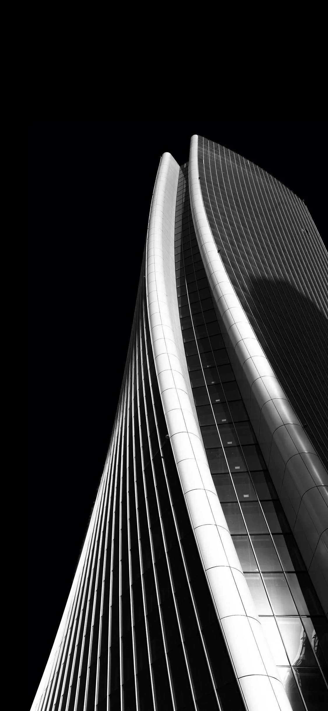 Futuristic Black and White Tower with Sharp Lines Wallpaper
