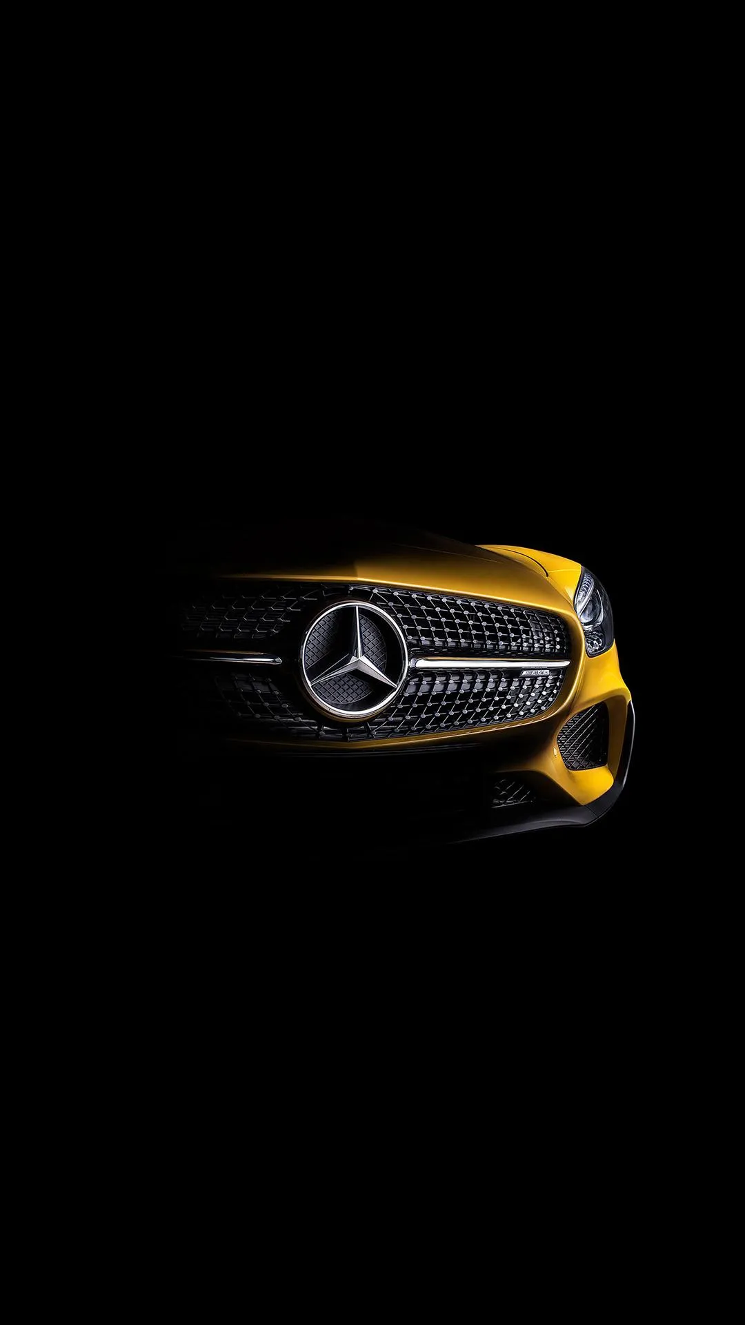 Futuristic Car Headlight Glow in Dark Background Wallpaper