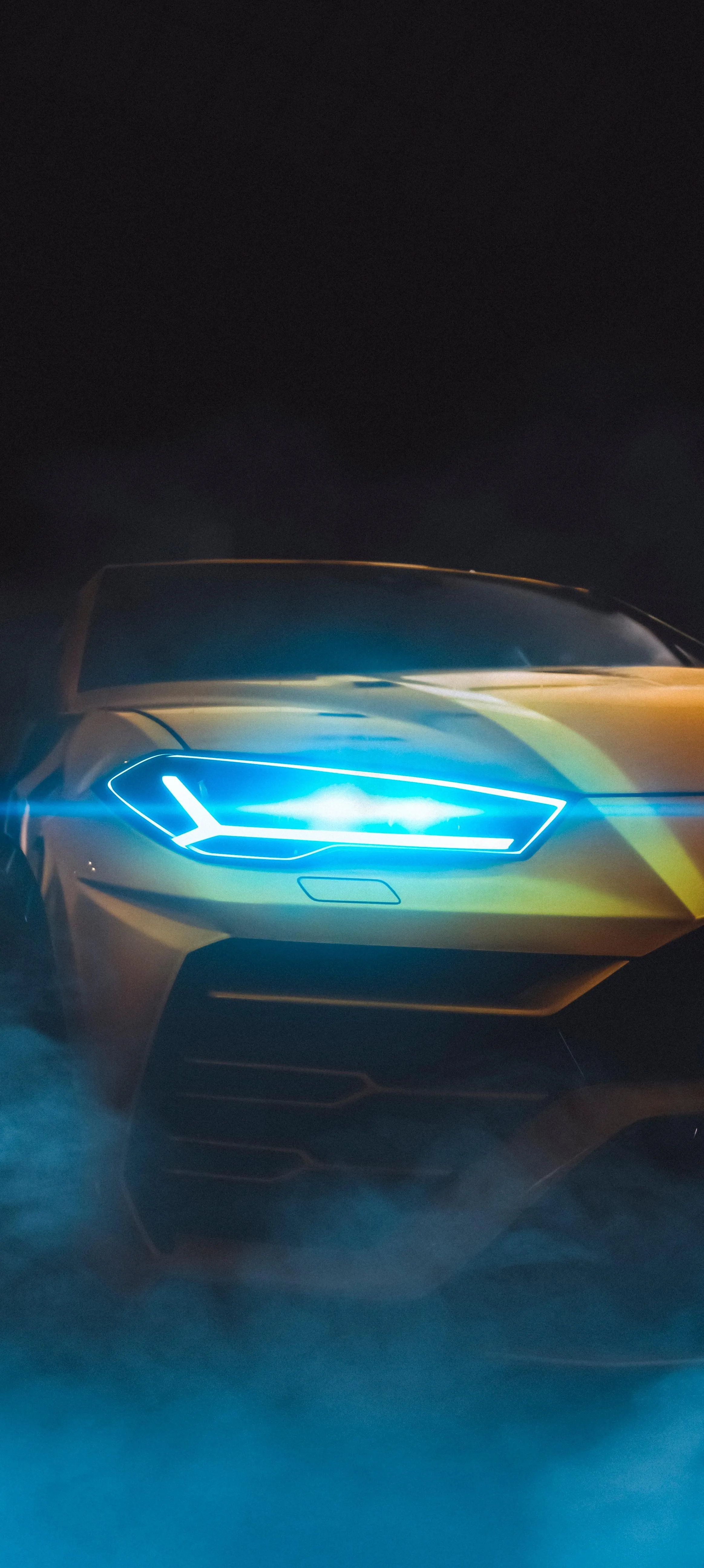 Futuristic Car Headlights Glowing in a Misty Dark Background
