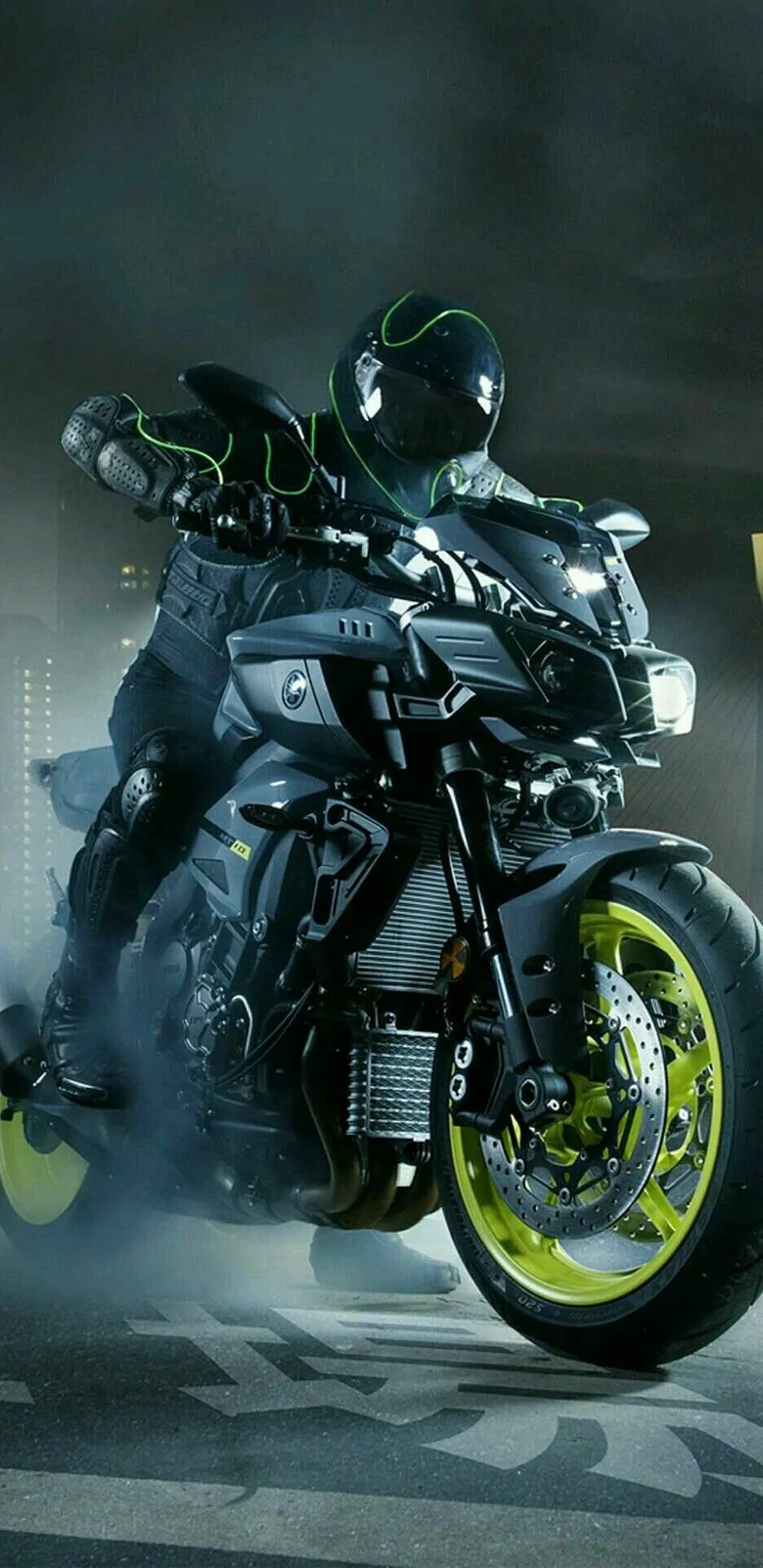 Futuristic Motorcycle Rider with Neon Highlights Wallpaper