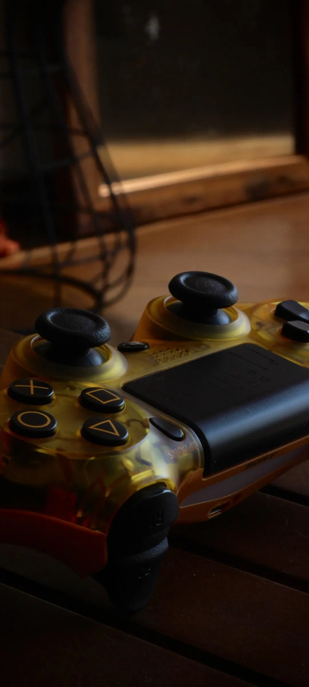 Game Controller on Wooden Desk Warm Light Aesthetic