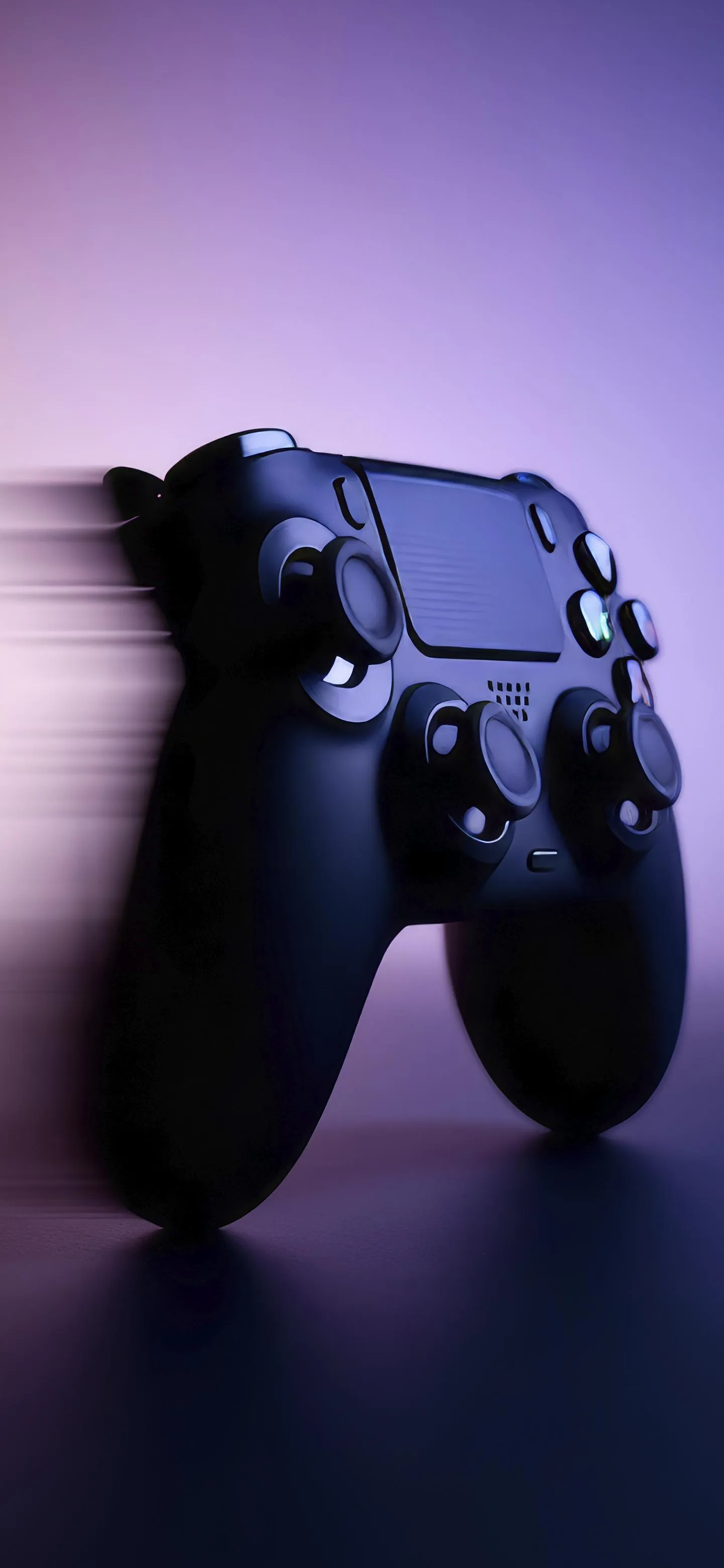 Gaming Controller in Purple Neon Light Environment Wallpaper