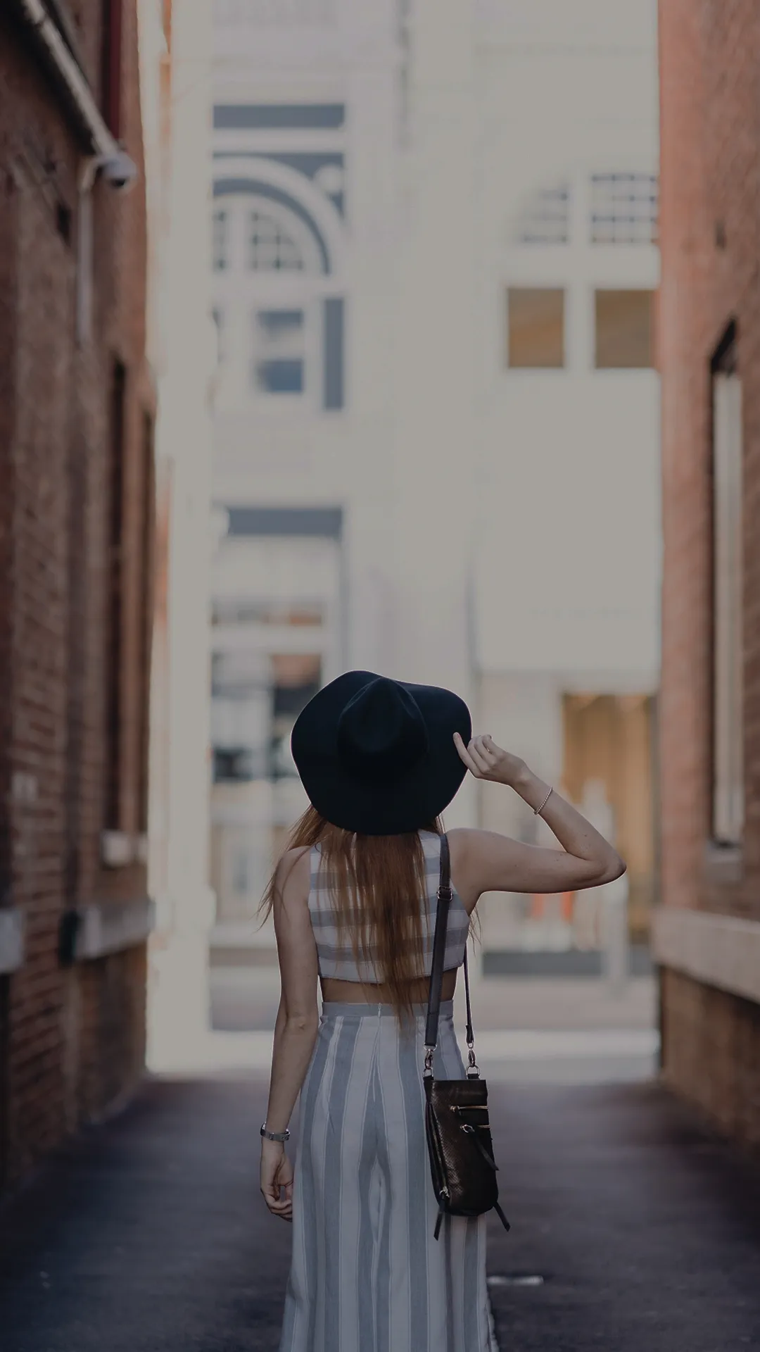 Girl Walking Through Urban Alley Minimal Street View Image