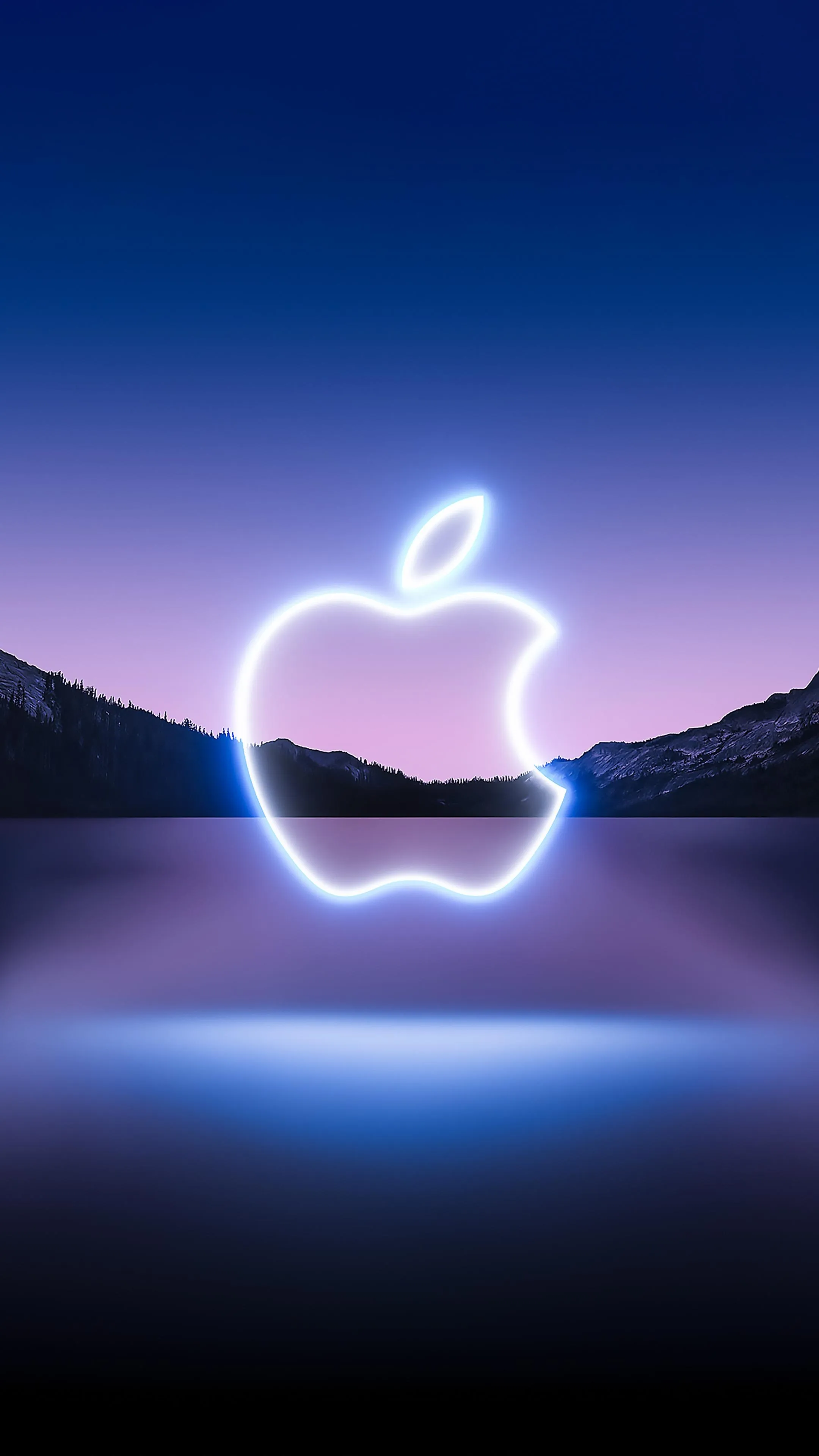 Glowing Apple Logo on Dark Background with Subtle Light