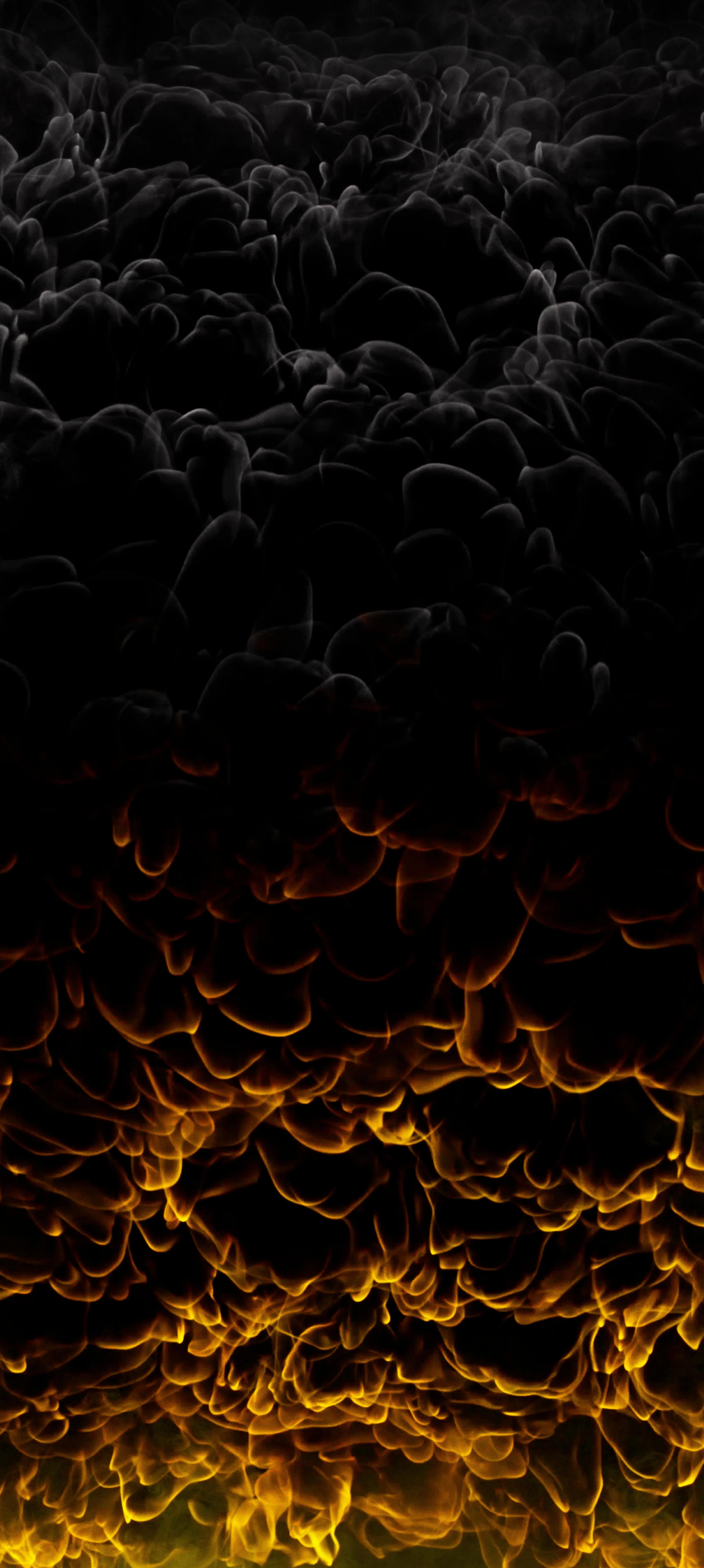 Glowing Fiery Clouds Rising Against Pitch Black Sky Background