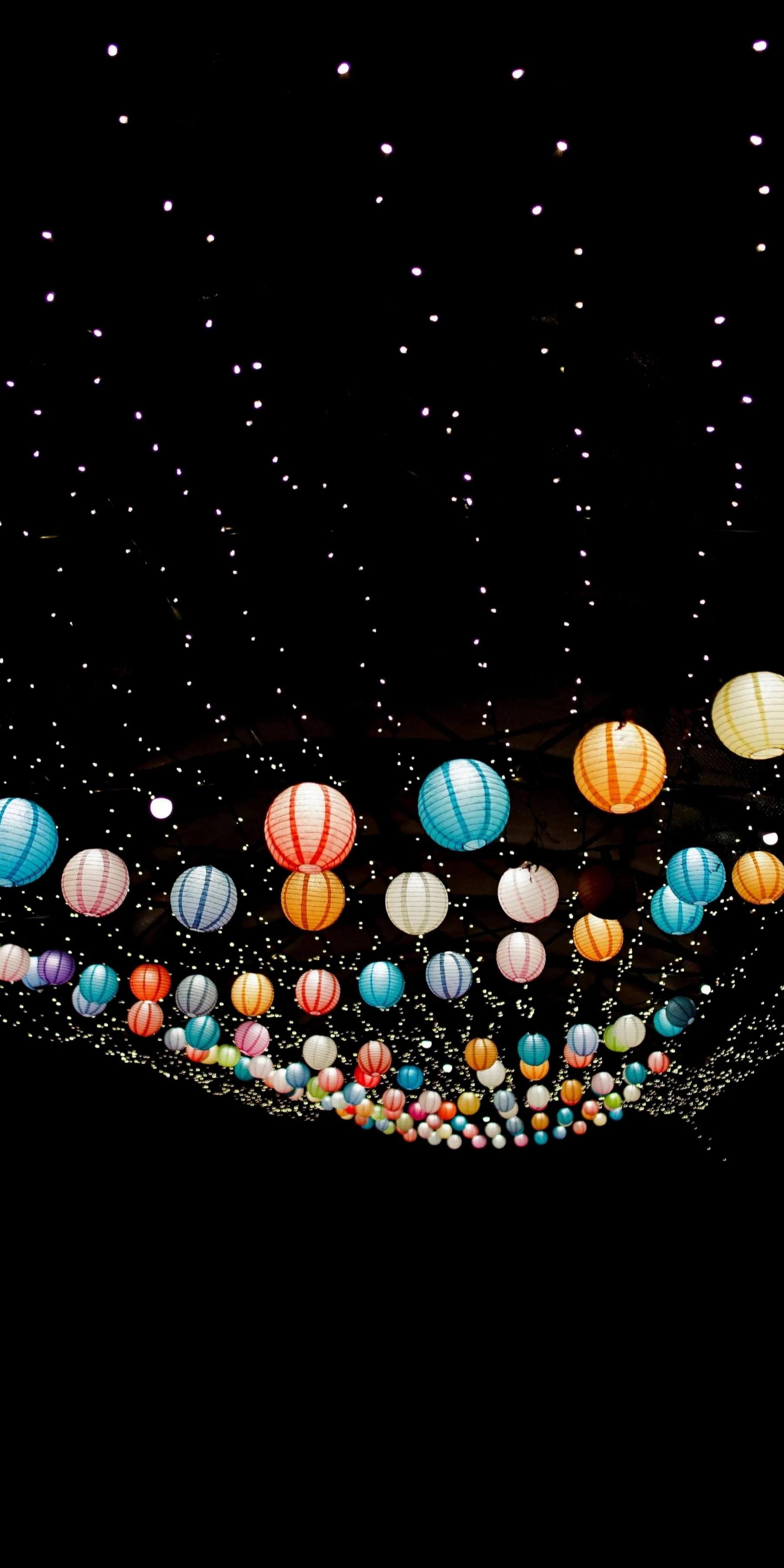 Glowing Street Lights with Floating Lantern Effect Wallpaper