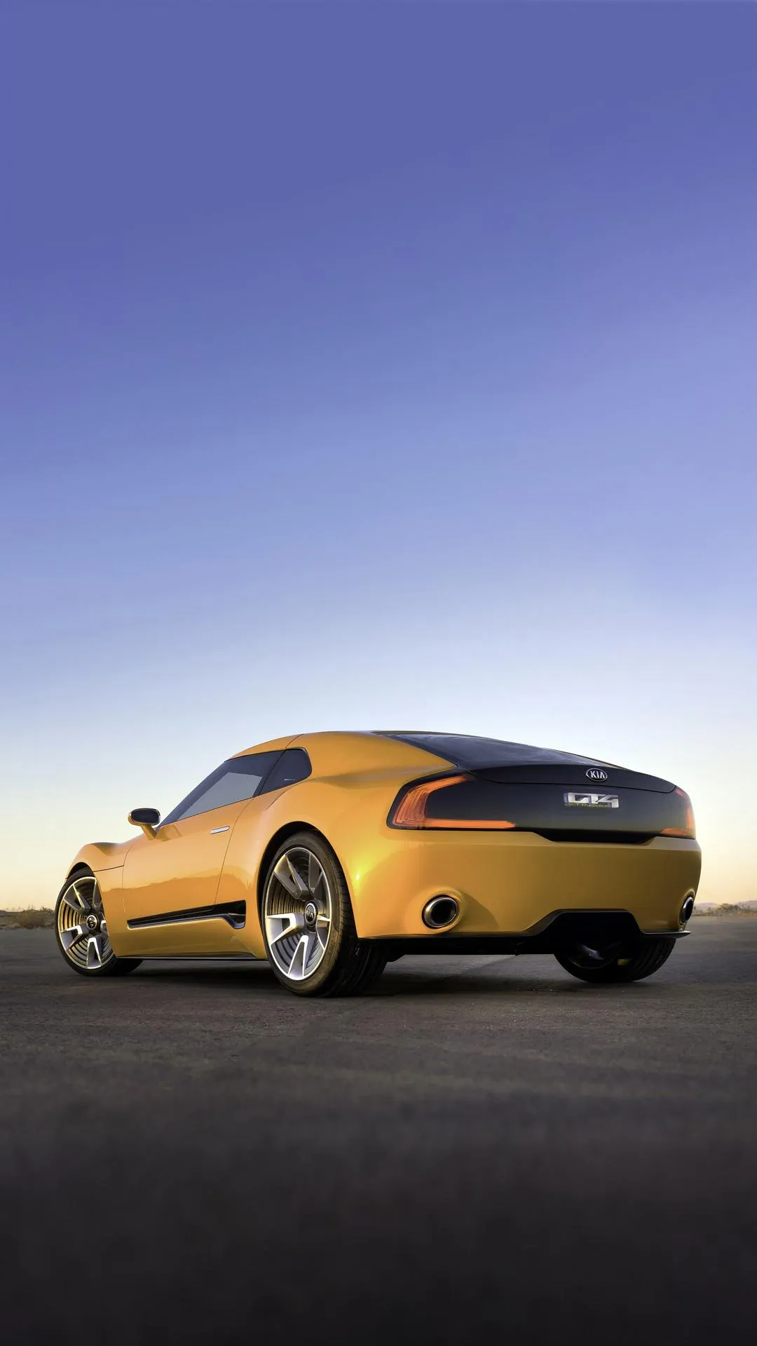 Golden Car Parked in Desert During Sunset Hour Wallpaper