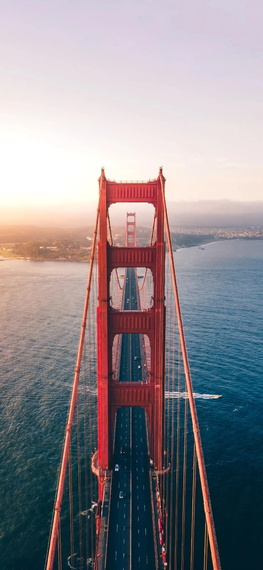 Golden Gate Bridge at Sunrise with Glowing Horizon