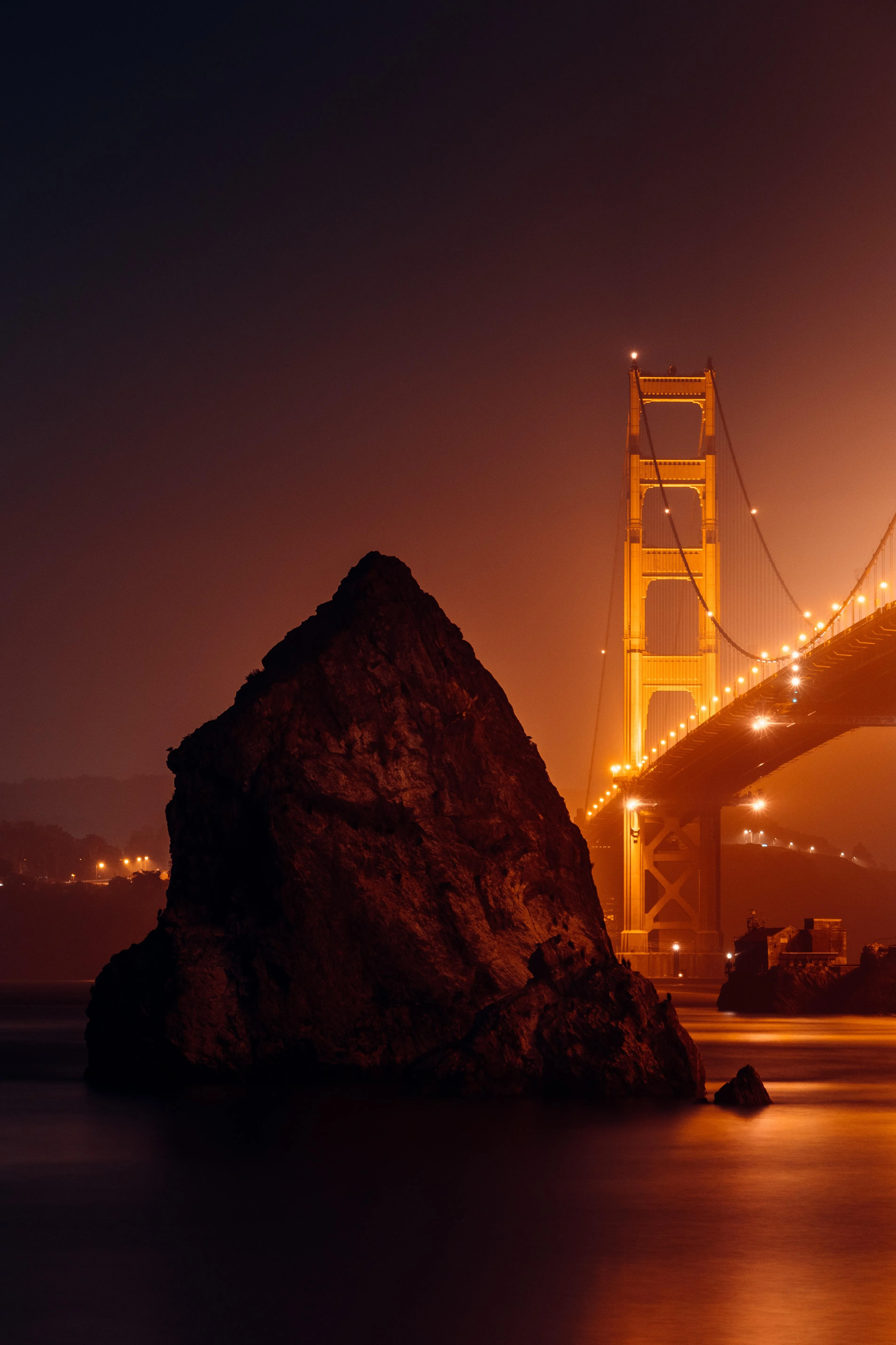 Golden Gate Bridge View at Sunset with Rocks Wallpaper