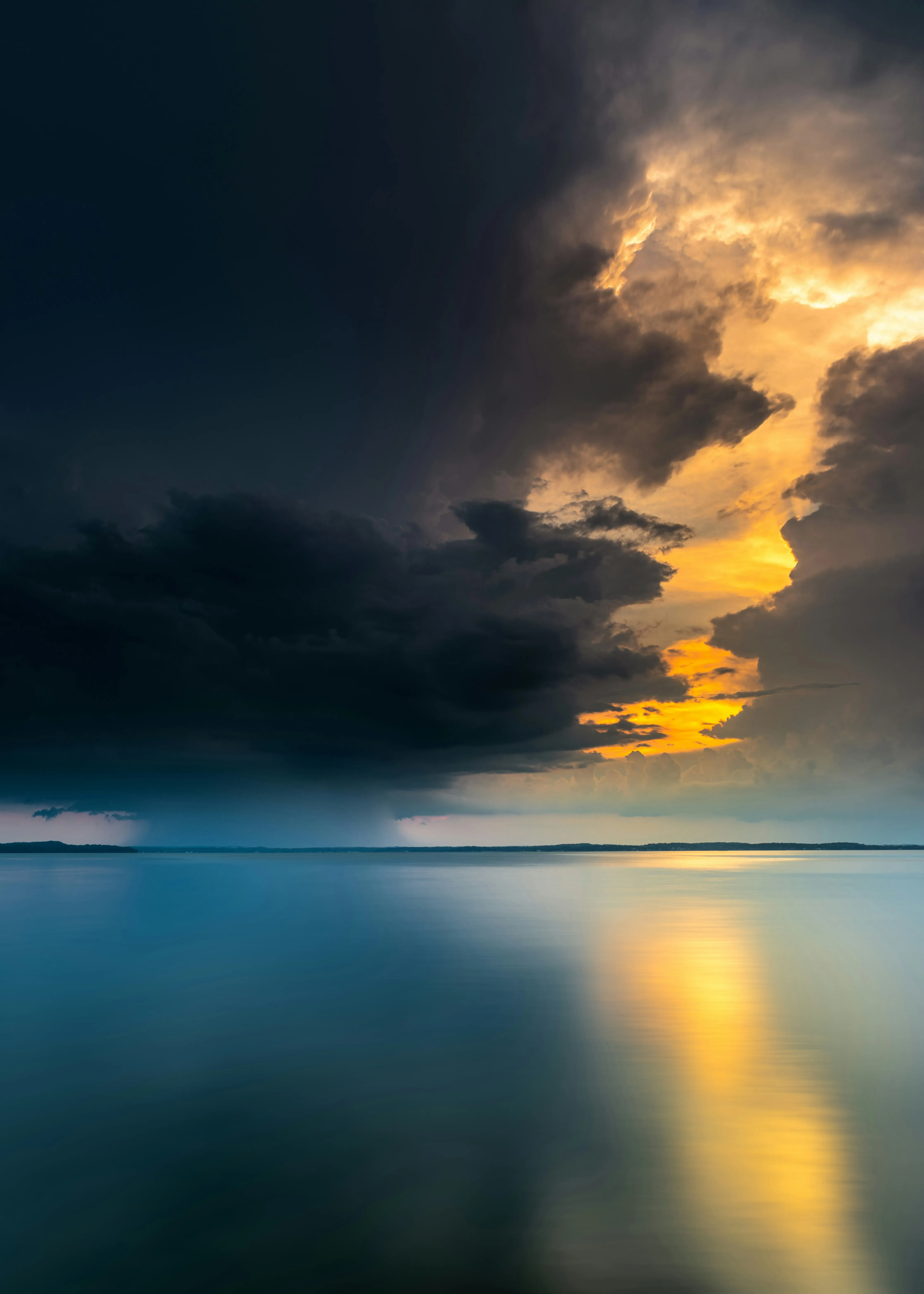 Golden Light Breaking Through Cloudy Ocean Sky Wallpaper