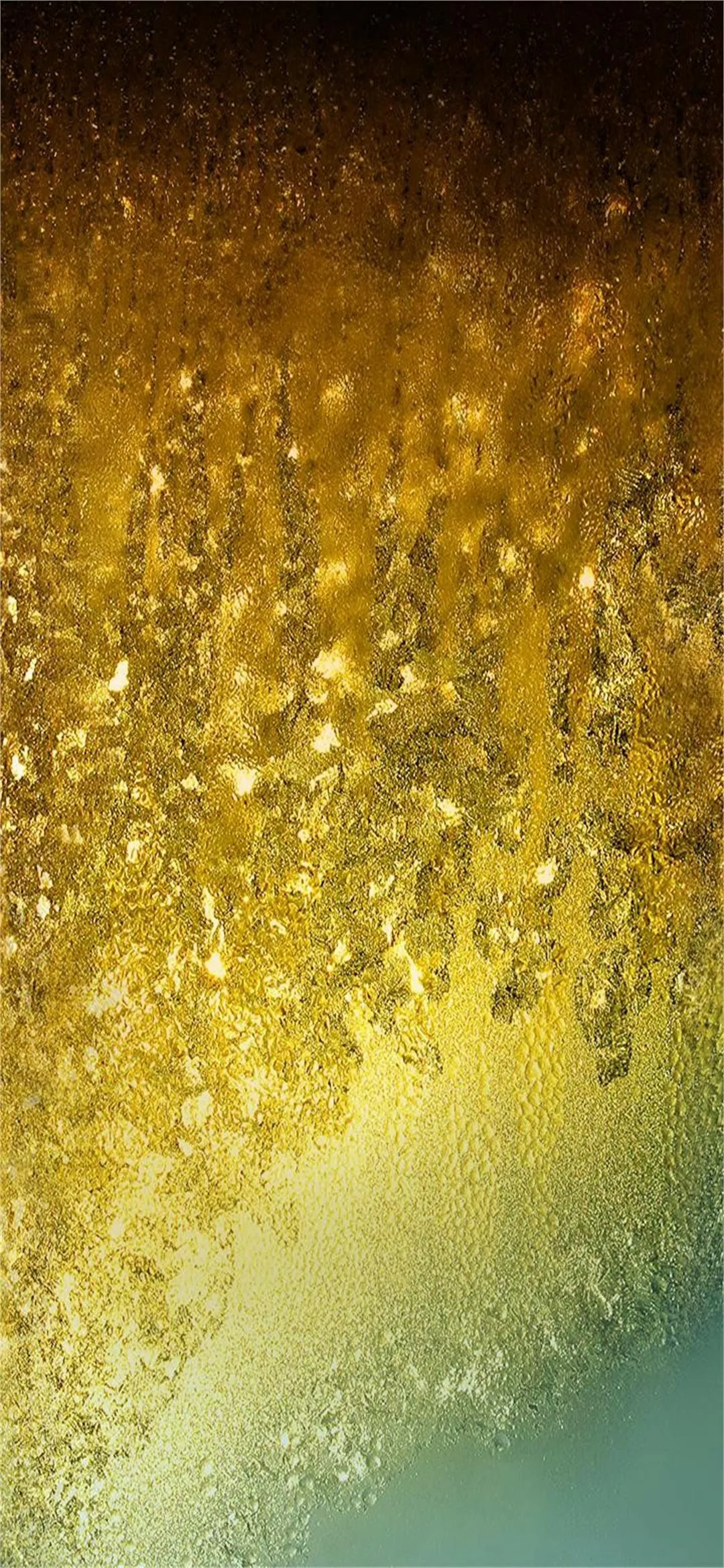 Golden Particles Falling on Dark Background with Bokeh Effect