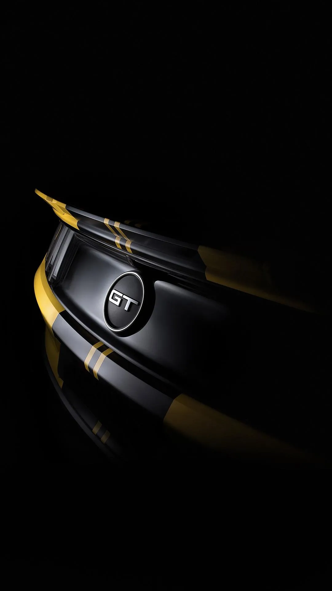 Golden Sports Car Illuminated in Dark Environment Wallpaper