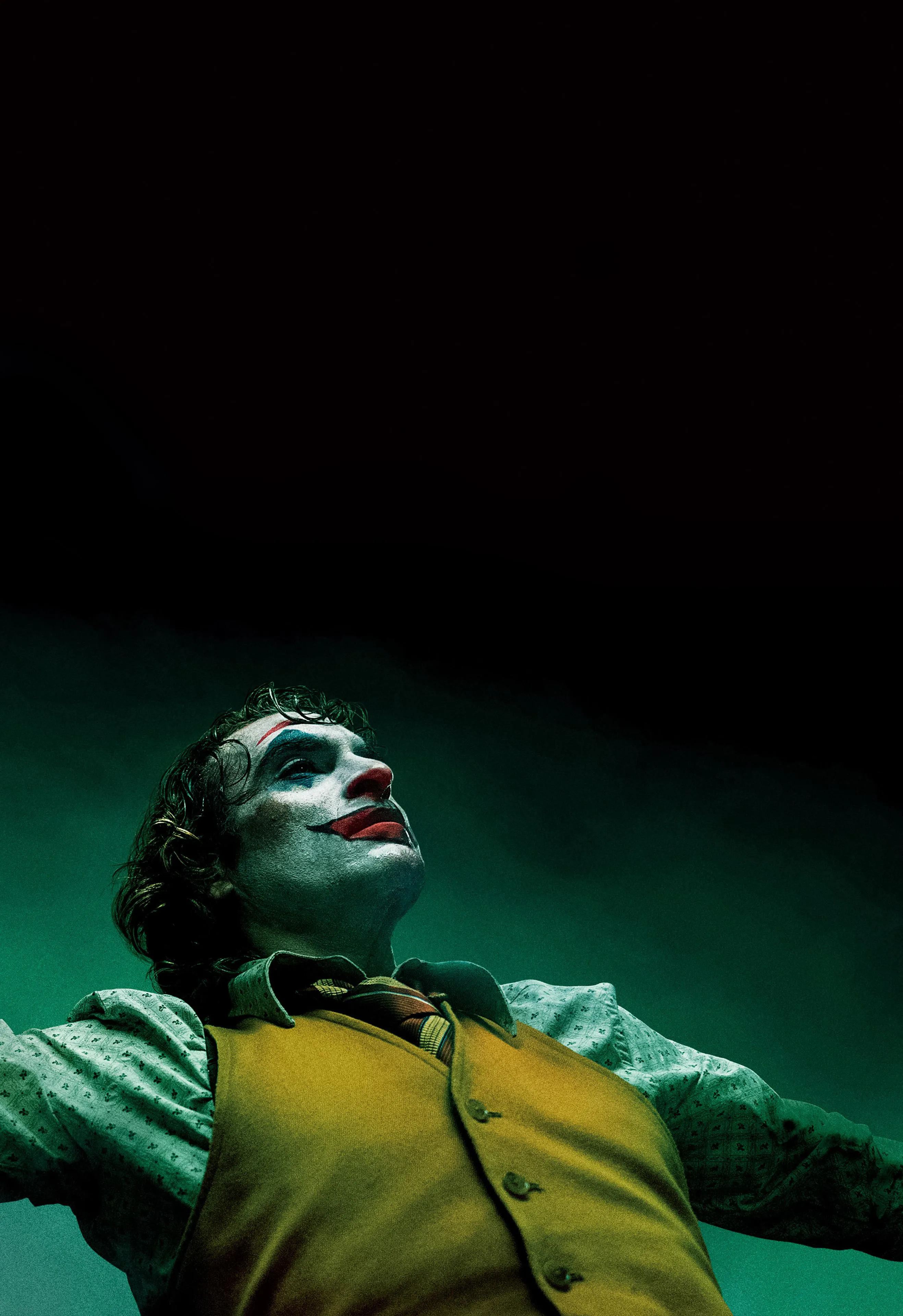 Green Suited Man Staring Upward in Moody Atmosphere