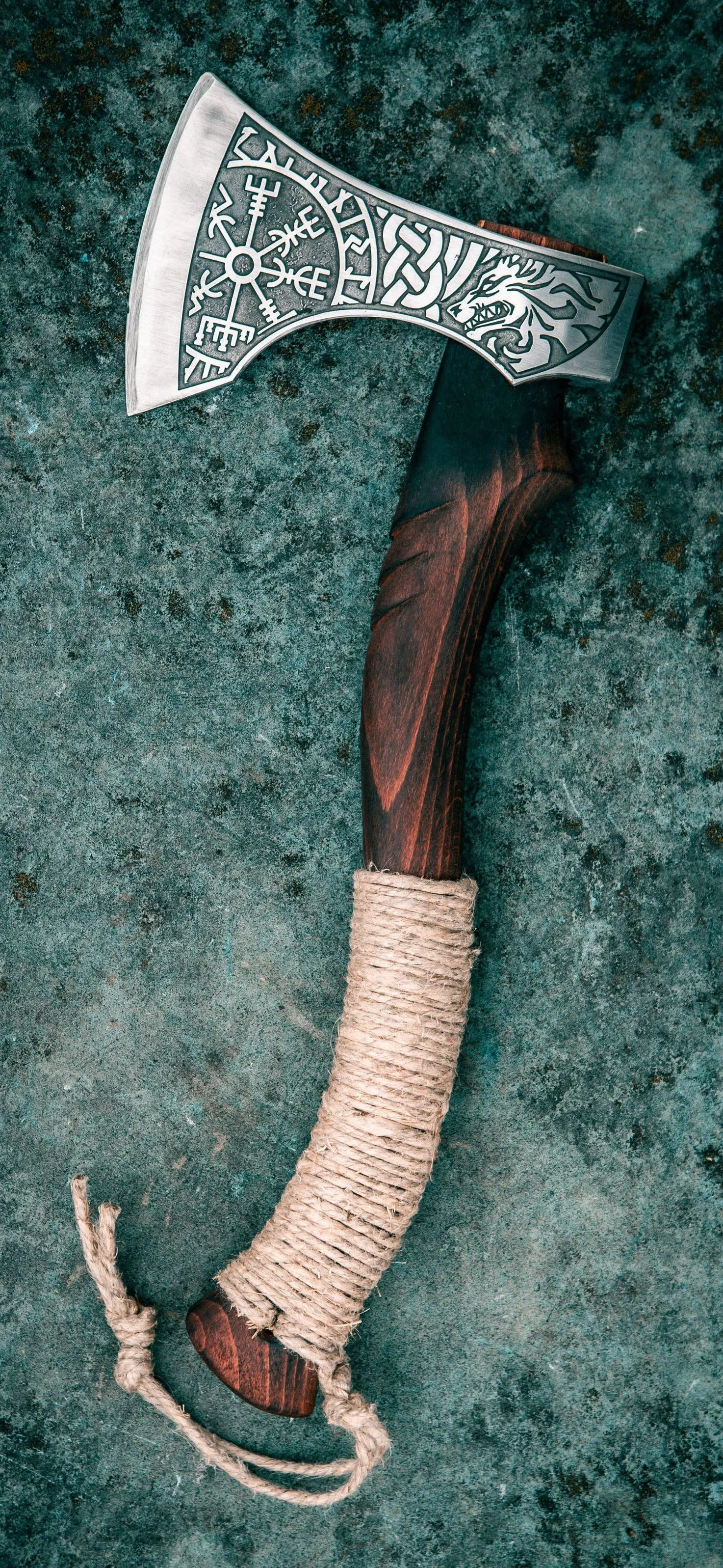 Handcrafted Vintage Axe on Textured Blue Green Background